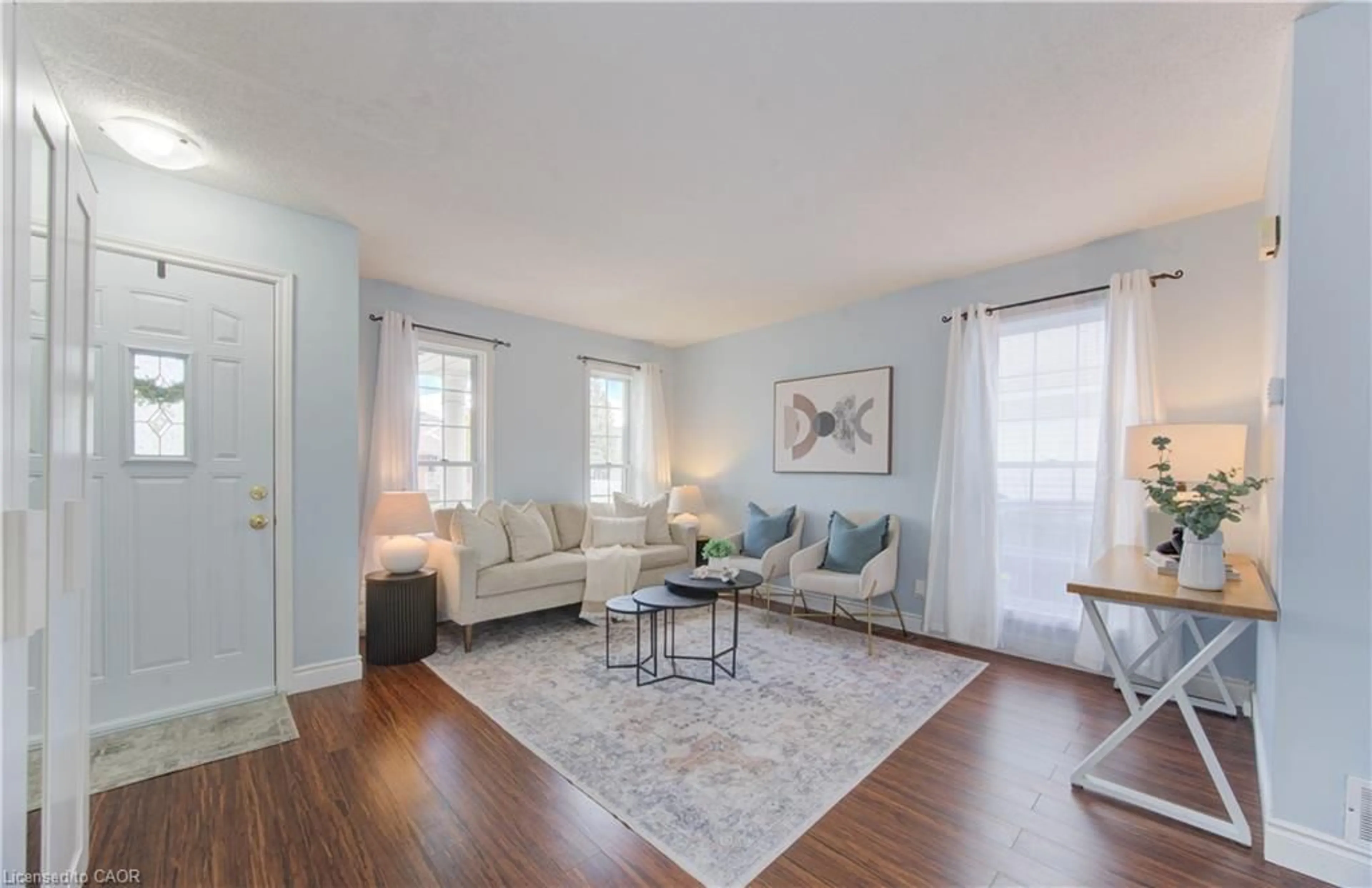 Living room with furniture, wood/laminate floor for 113 Wake Robin Dr, Kitchener Ontario N2E 3L4