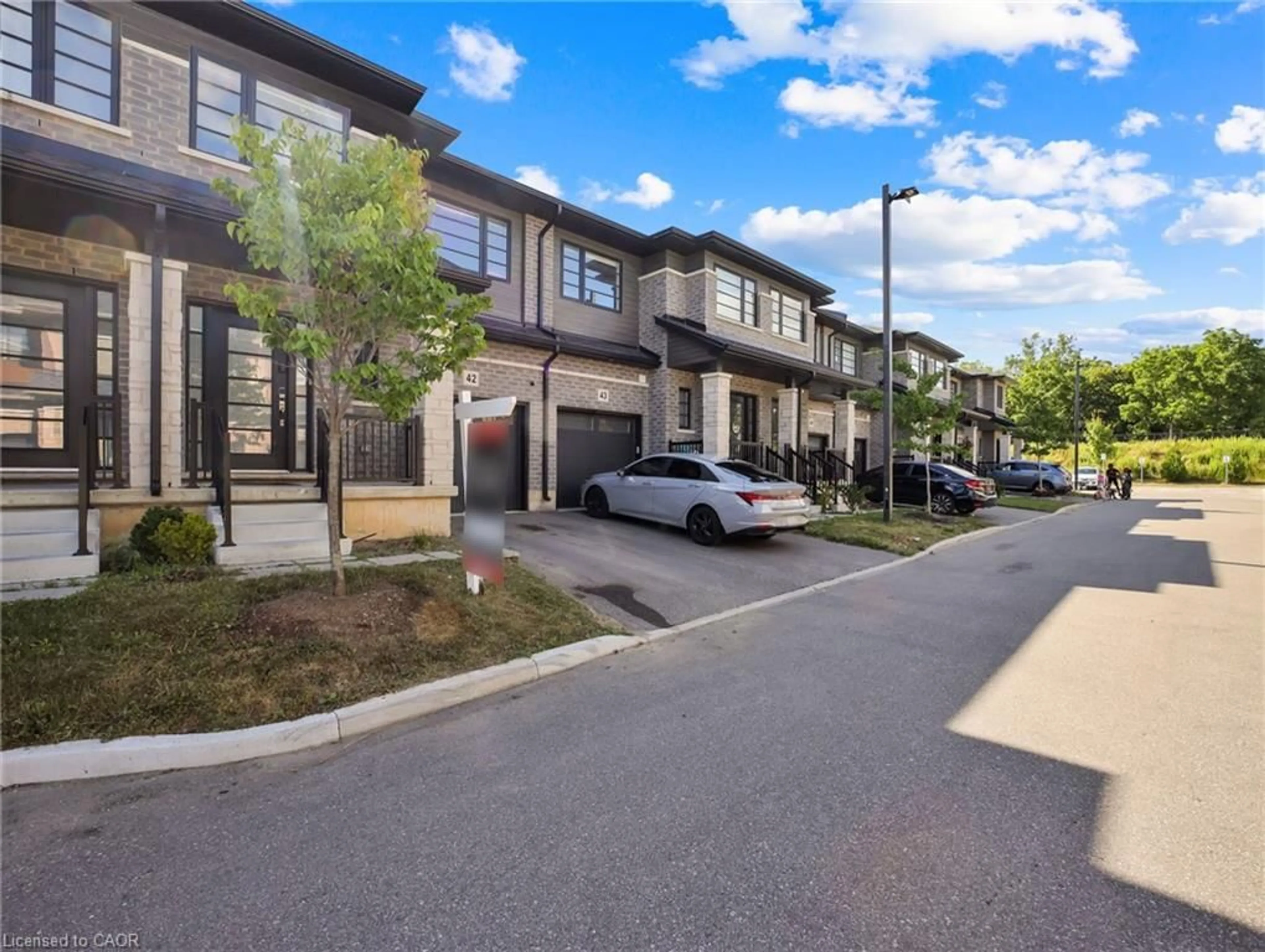 A pic from outside/outdoor area/front of a property/back of a property/a pic from drone, street for 520 Grey St #42, Brantford Ontario N3S 6T6
