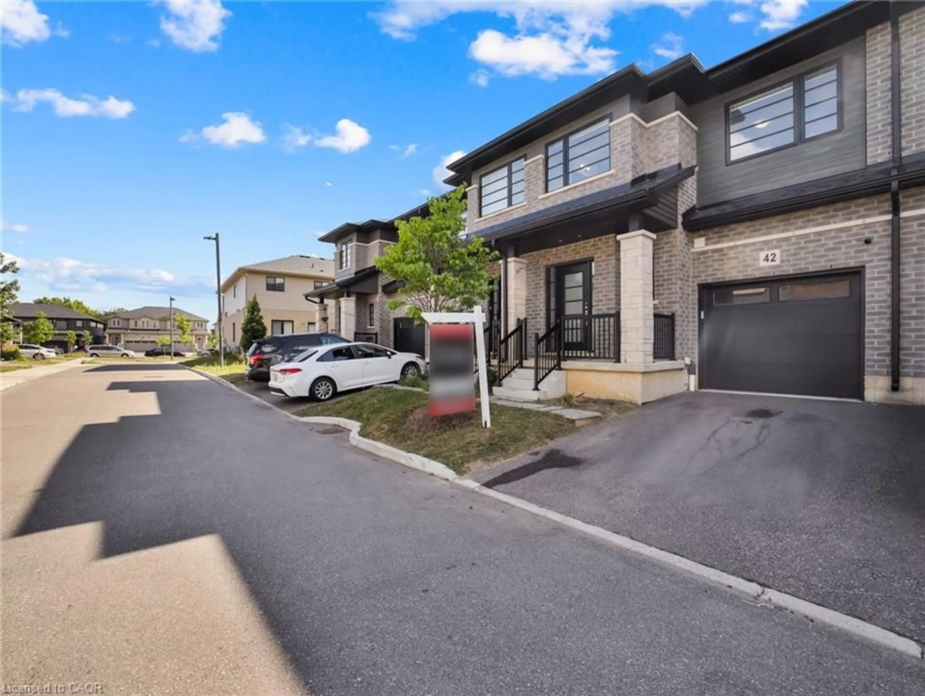 A pic from outside/outdoor area/front of a property/back of a property/a pic from drone, street for 520 Grey St #42, Brantford Ontario N3S 6T6