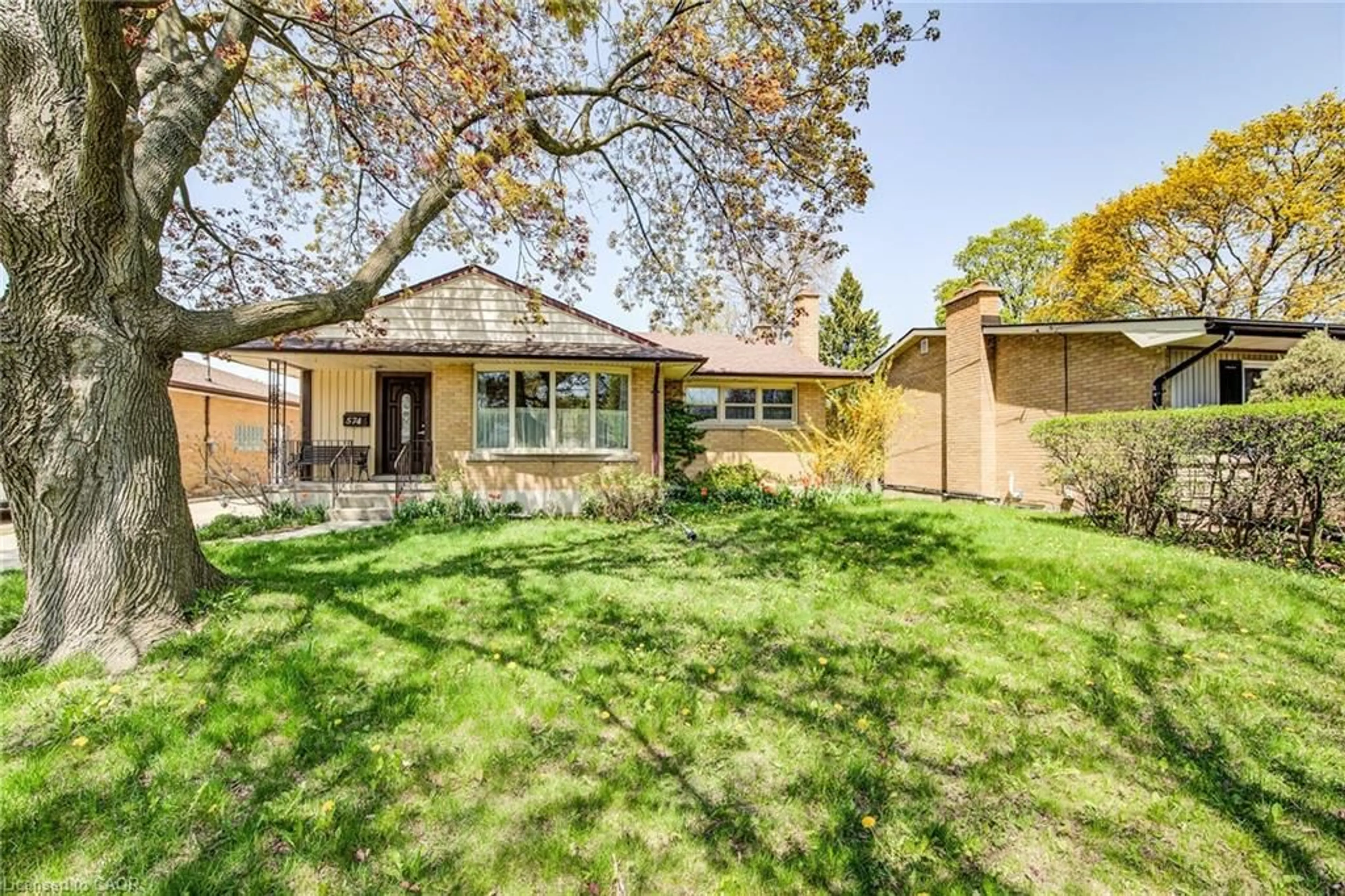 Home with brick exterior material, street for 574 Krug St, Kitchener Ontario N2B 1L7