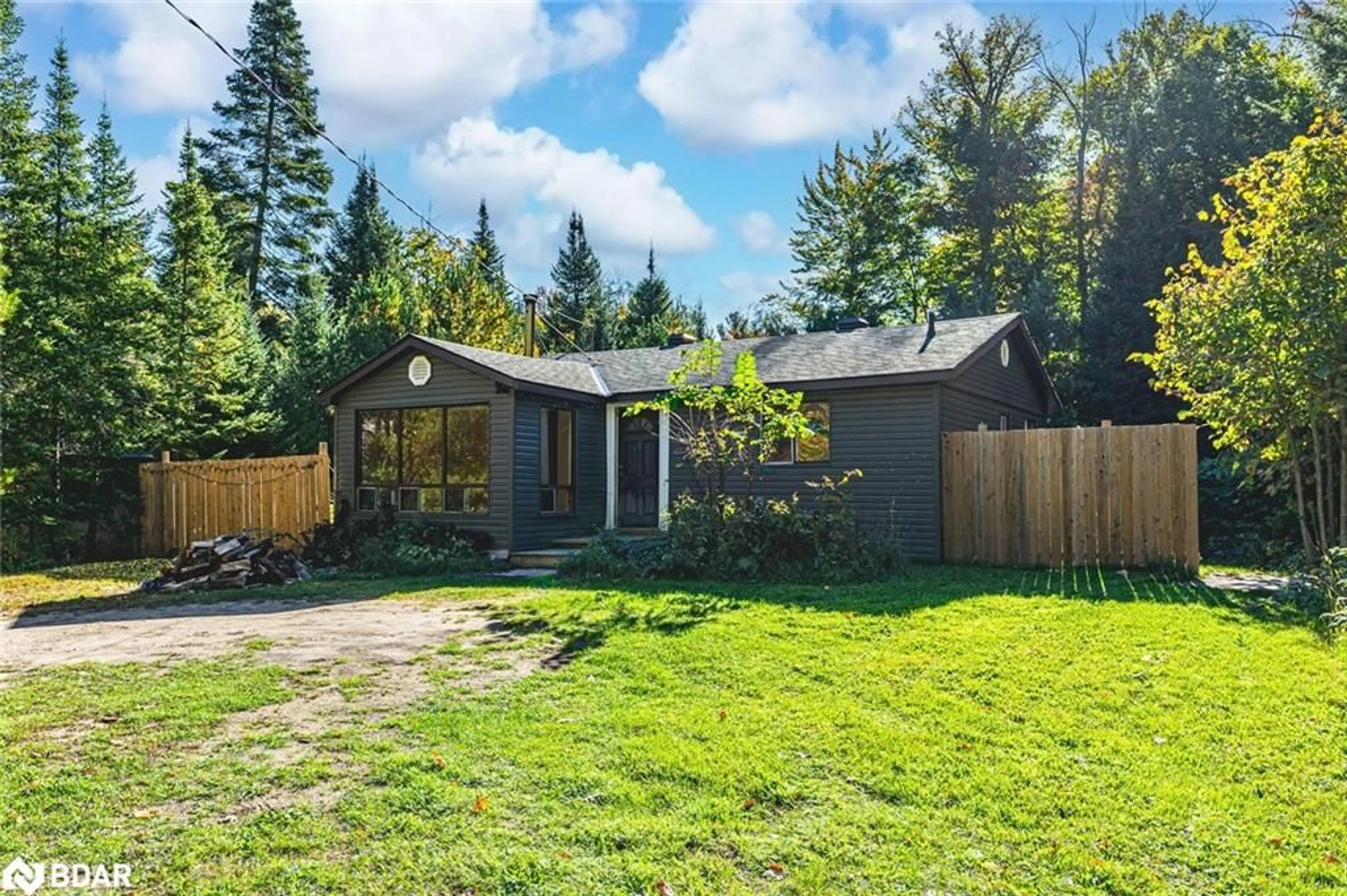 A pic from outside/outdoor area/front of a property/back of a property/a pic from drone, forest/trees view for 138 Moreau Pky, Tiny Ontario L9M 0H3