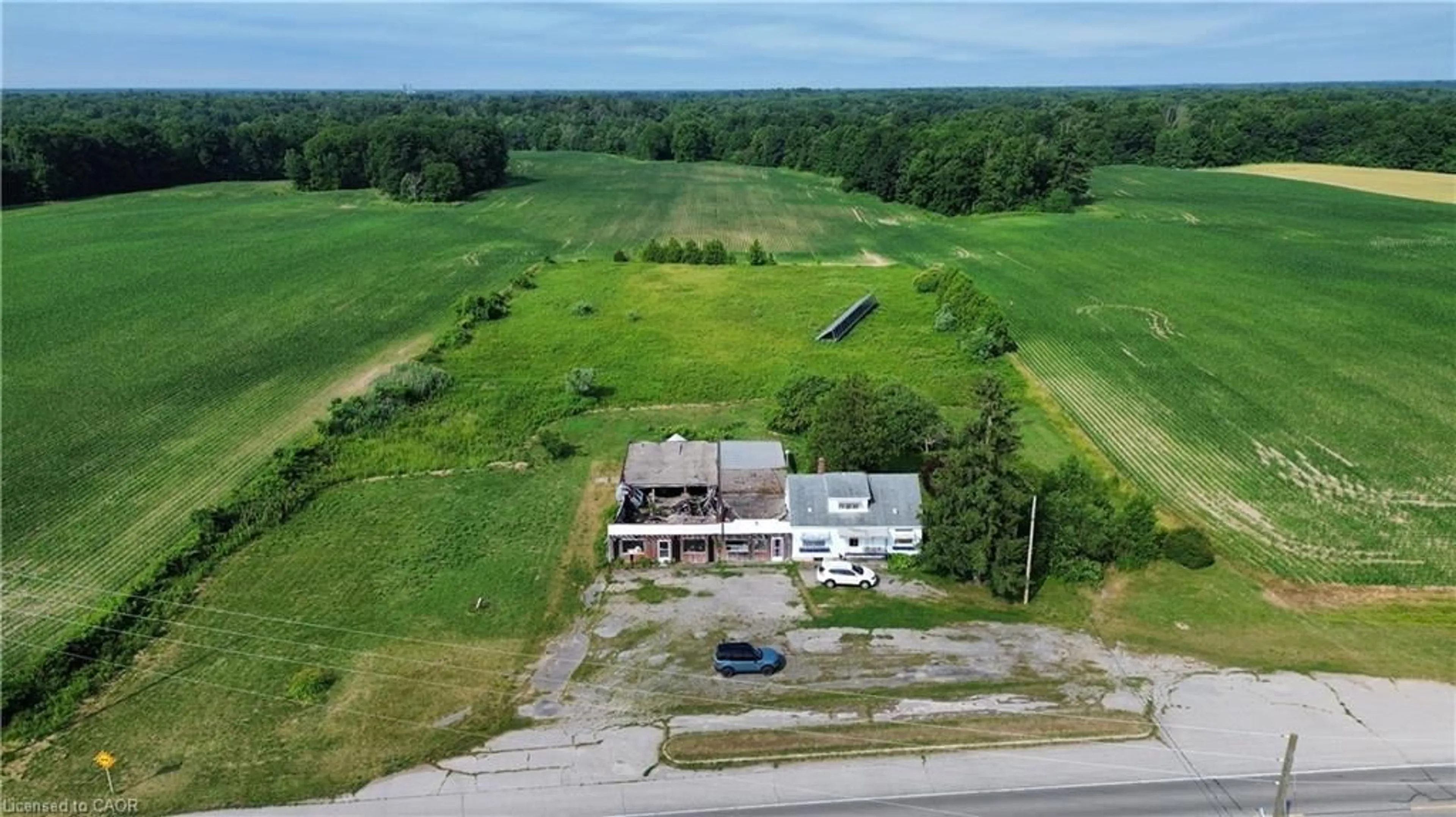 A pic from outside/outdoor area/front of a property/back of a property/a pic from drone, building for 2995 Highway 59, Walsingham Ontario N0E 1G0