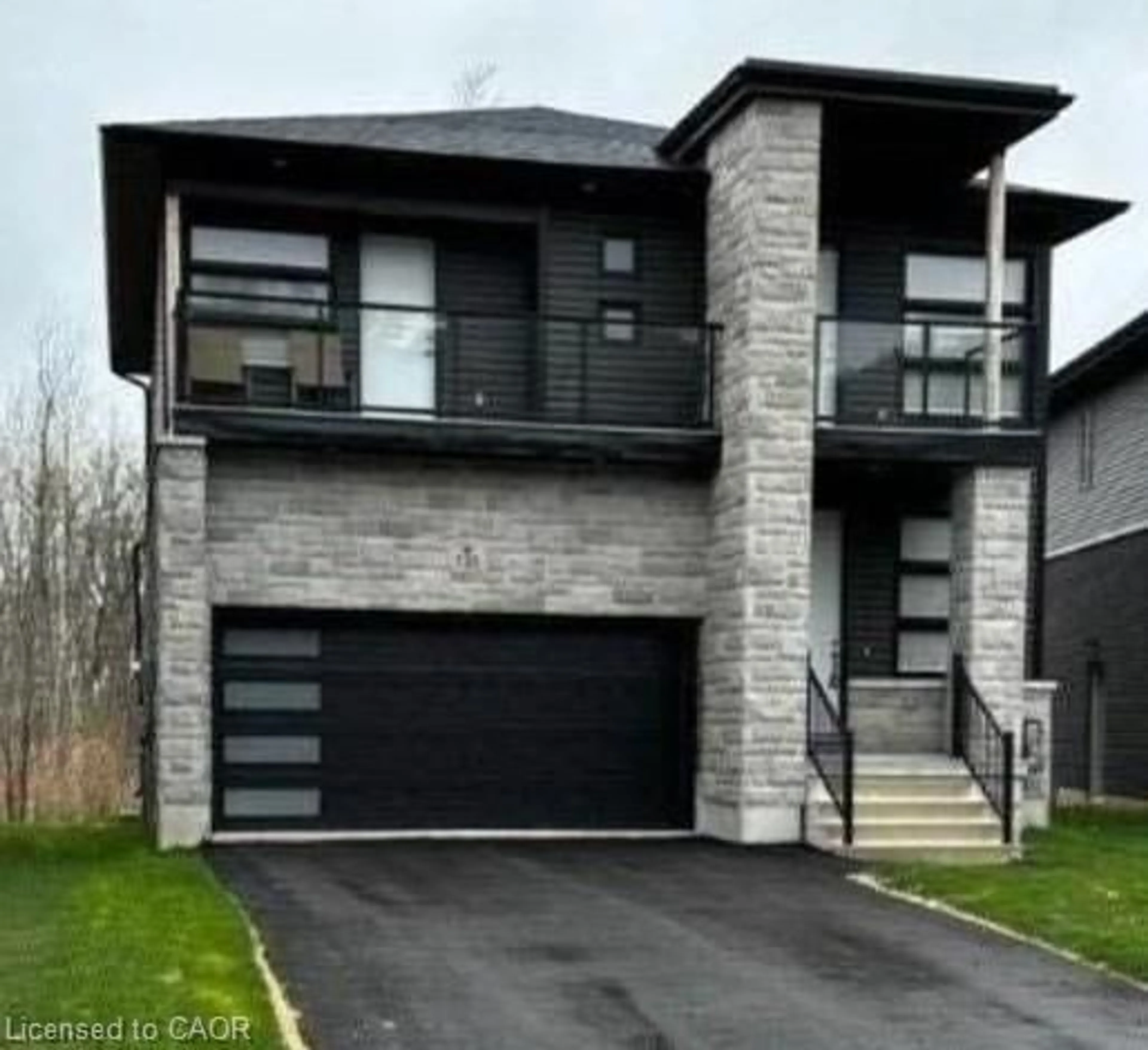 Home with brick exterior material, street for 135 Rosie St, The Blue Mountains Ontario N0H 1J0