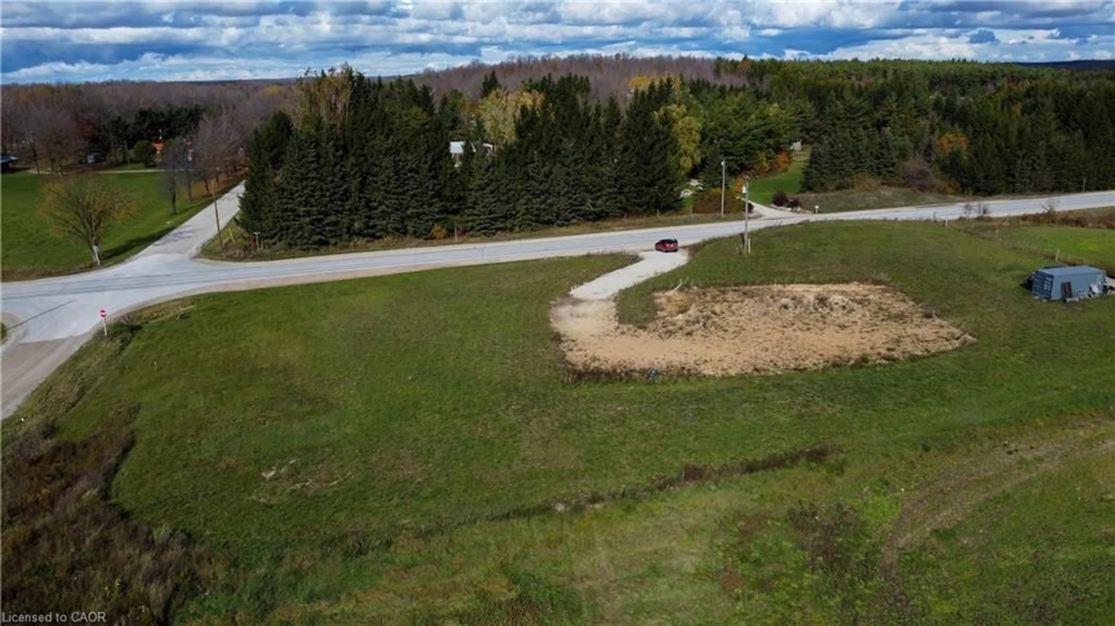 A pic from outside/outdoor area/front of a property/back of a property/a pic from drone, water/lake/river/ocean view for 409006 Grey Road 4, Feversham Ontario N0C 1C0