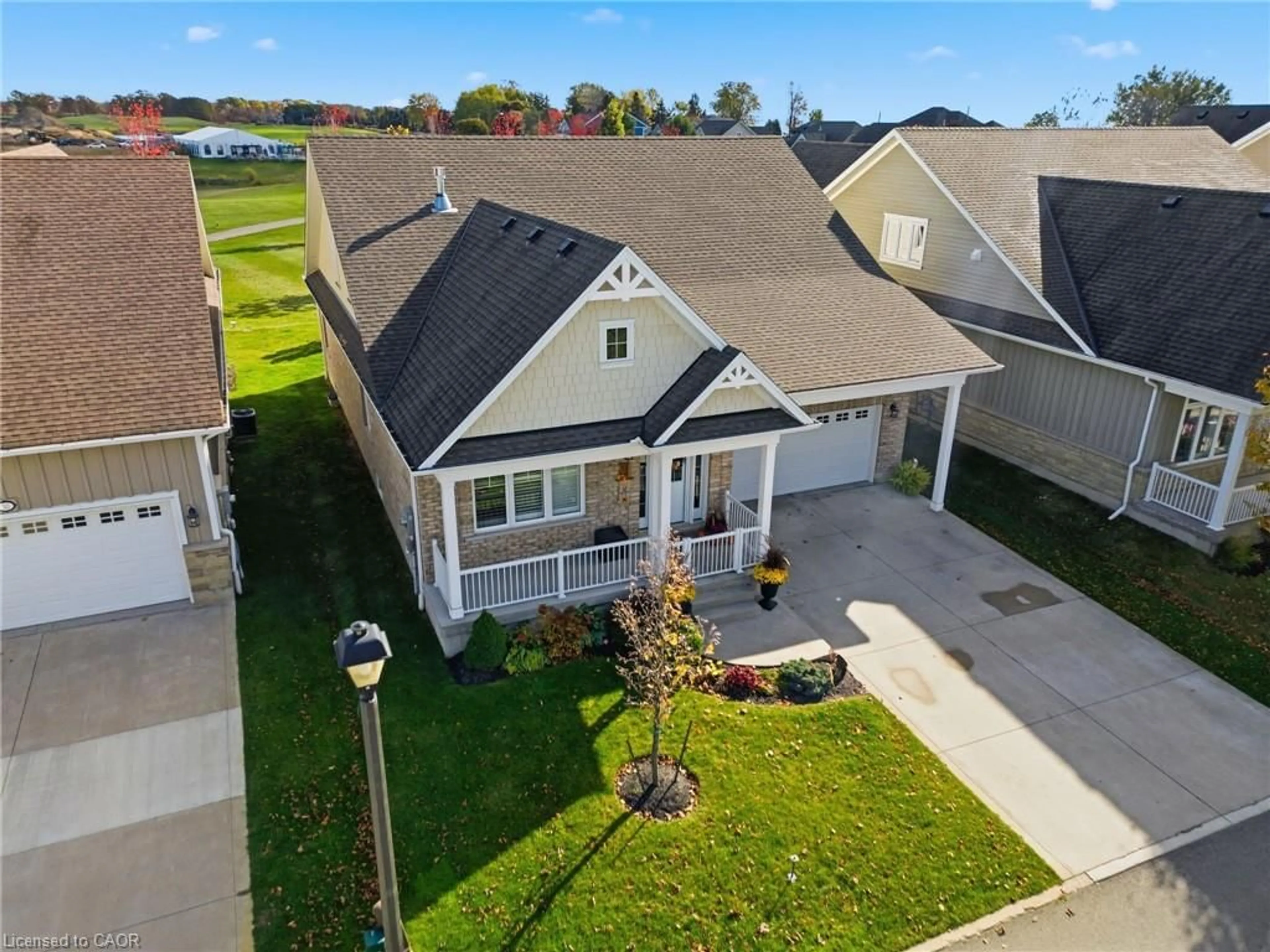 A pic from outside/outdoor area/front of a property/back of a property/a pic from drone, street for 34 Regatta Dr #89, Port Dover Ontario N0A 1N3