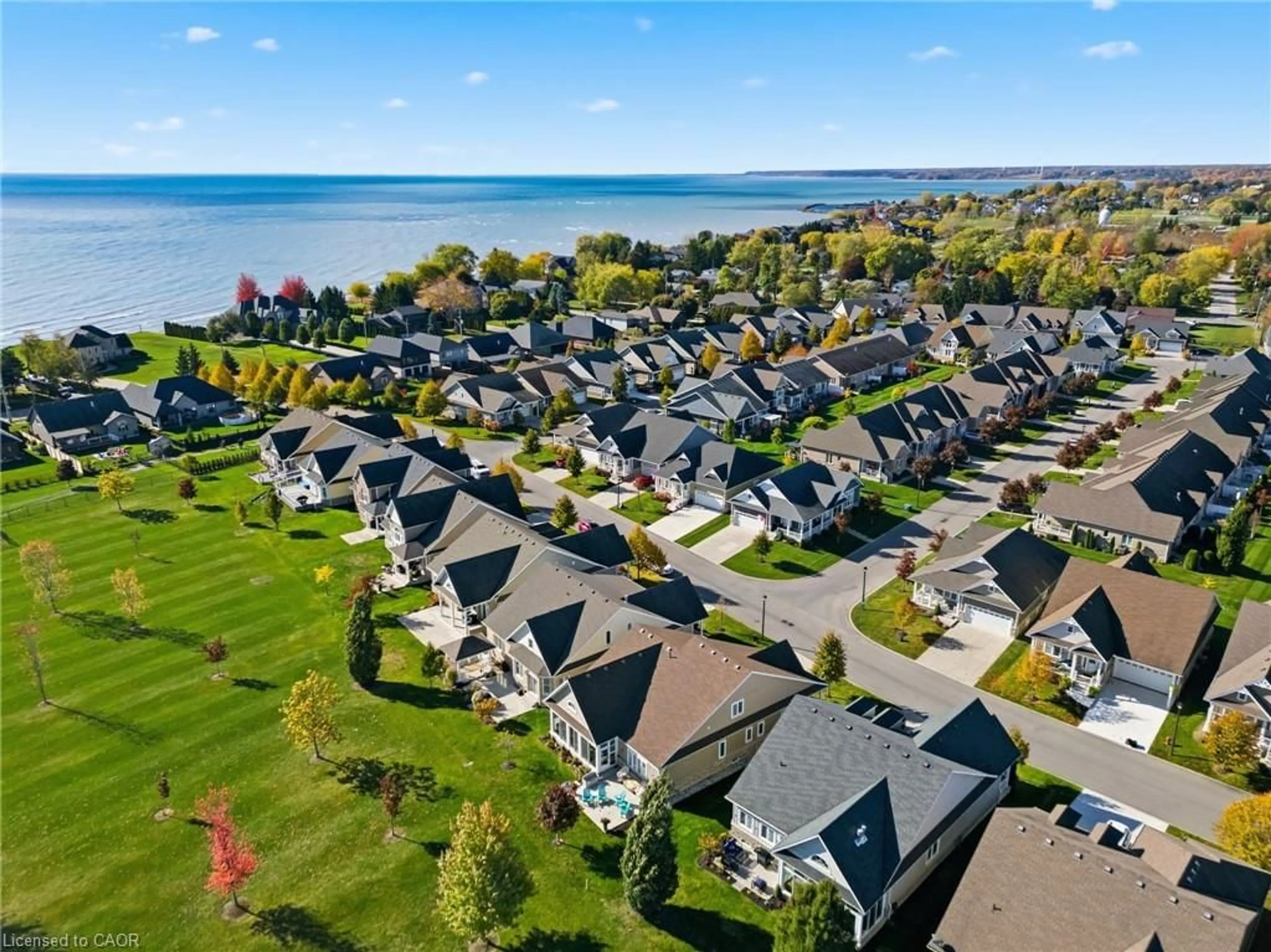 A pic from outside/outdoor area/front of a property/back of a property/a pic from drone, water/lake/river/ocean view for 34 Regatta Dr #89, Port Dover Ontario N0A 1N3