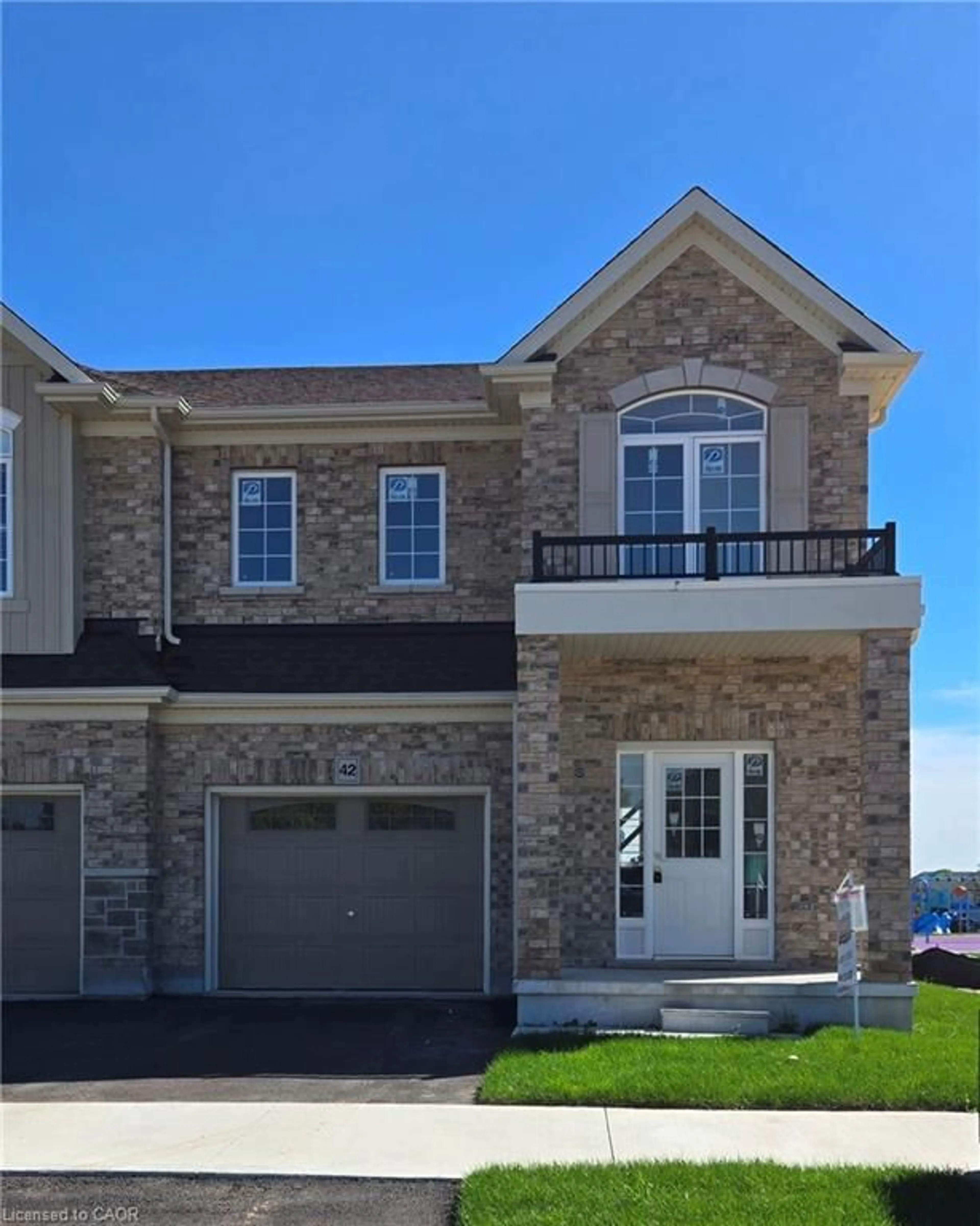 Home with brick exterior material, street for 42 Mccurdy Ave, Waterdown Ontario L8B 0T5