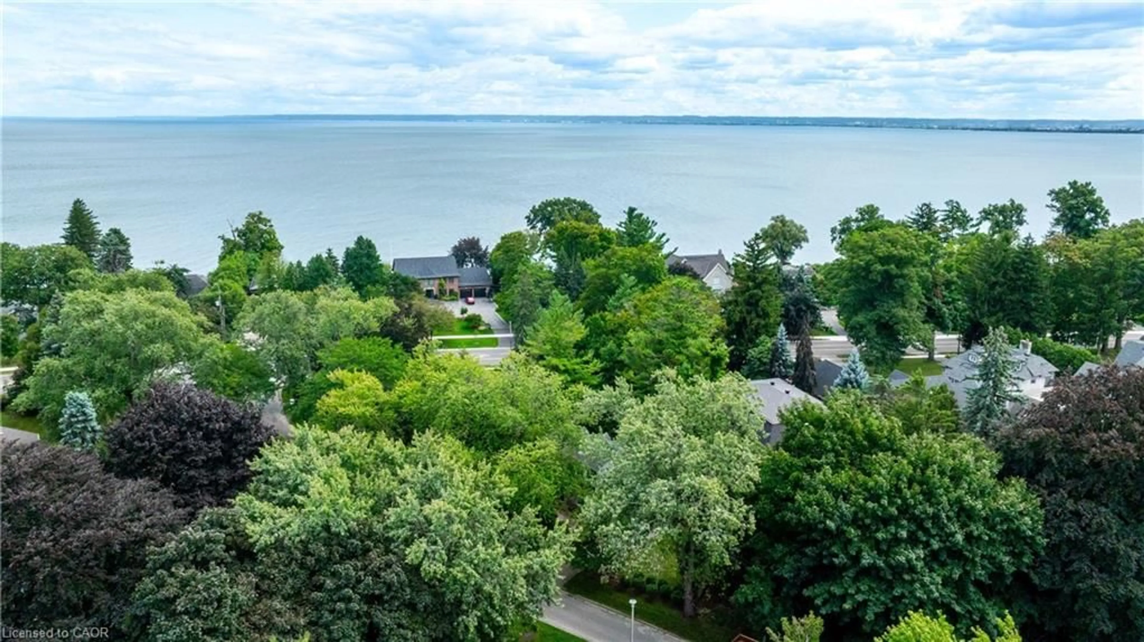 A pic from outside/outdoor area/front of a property/back of a property/a pic from drone, water/lake/river/ocean view for 206 Rossmore Blvd, Burlington Ontario L7N 1R1