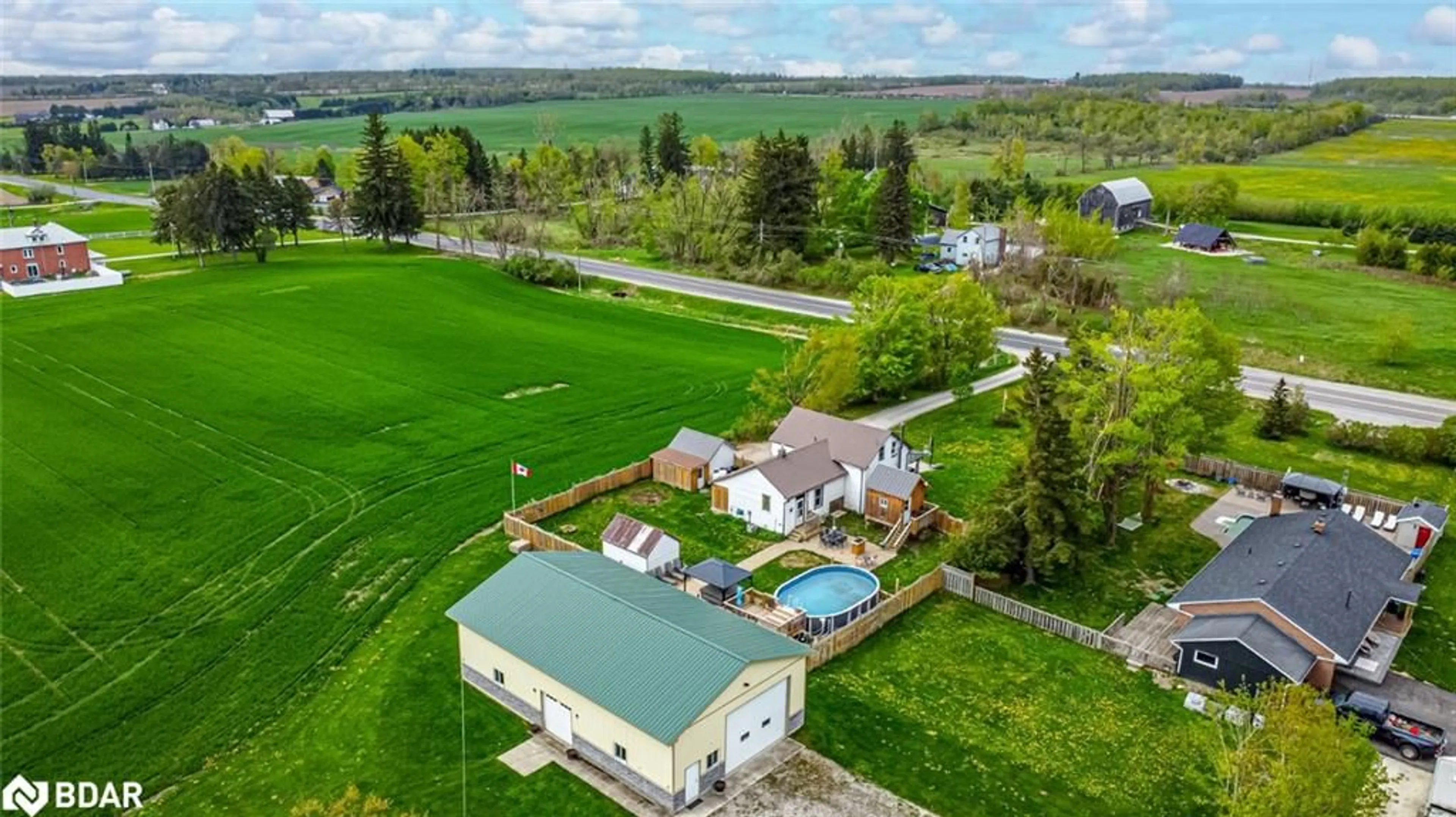 A pic from outside/outdoor area/front of a property/back of a property/a pic from drone, water/lake/river/ocean view for 1601 Penetanguishene Rd, Dalston Ontario L4M 4Y8