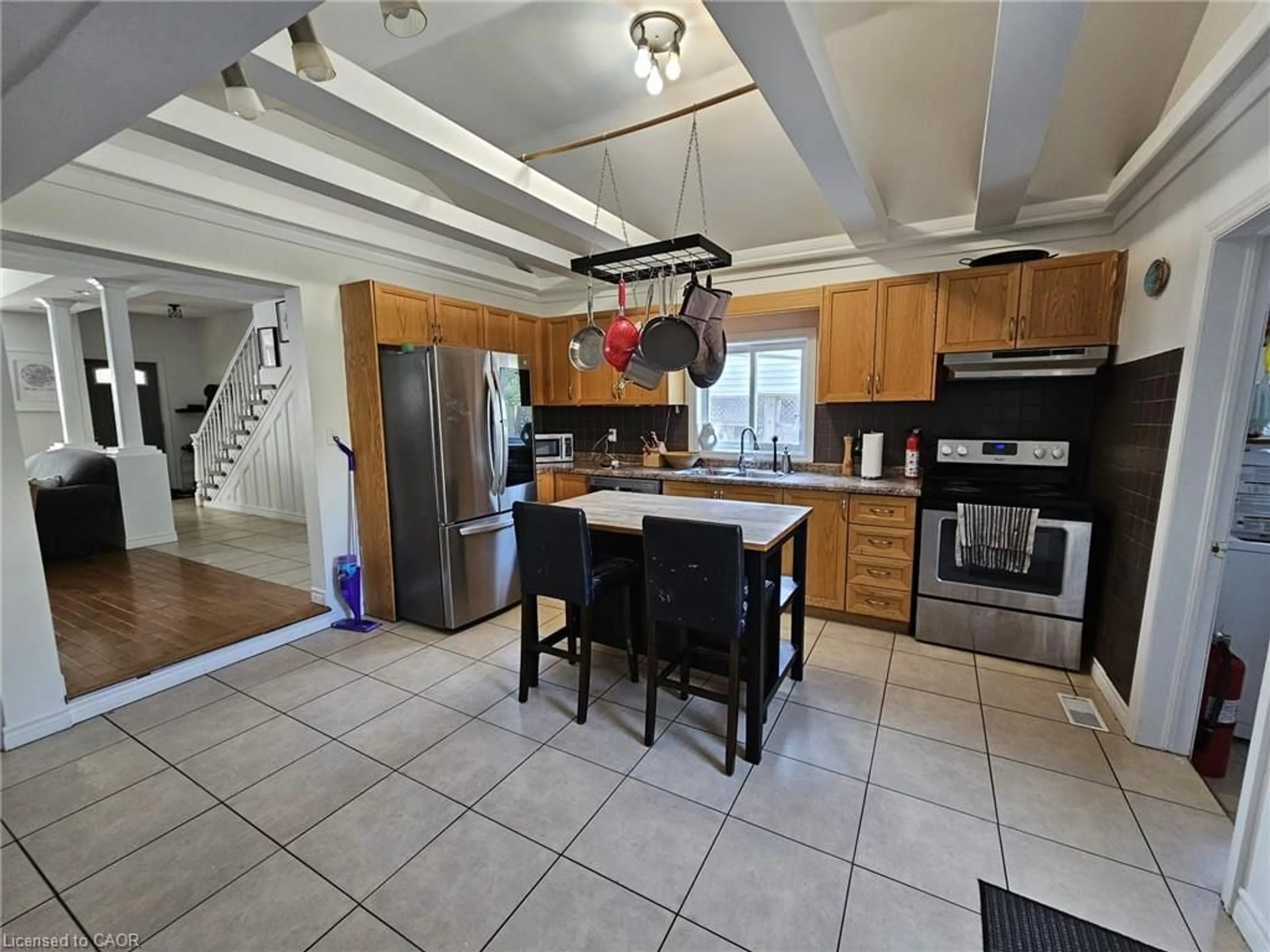 Open concept kitchen, ceramic/tile floor for 253 Mary St, Hamilton Ontario L8L 4W2