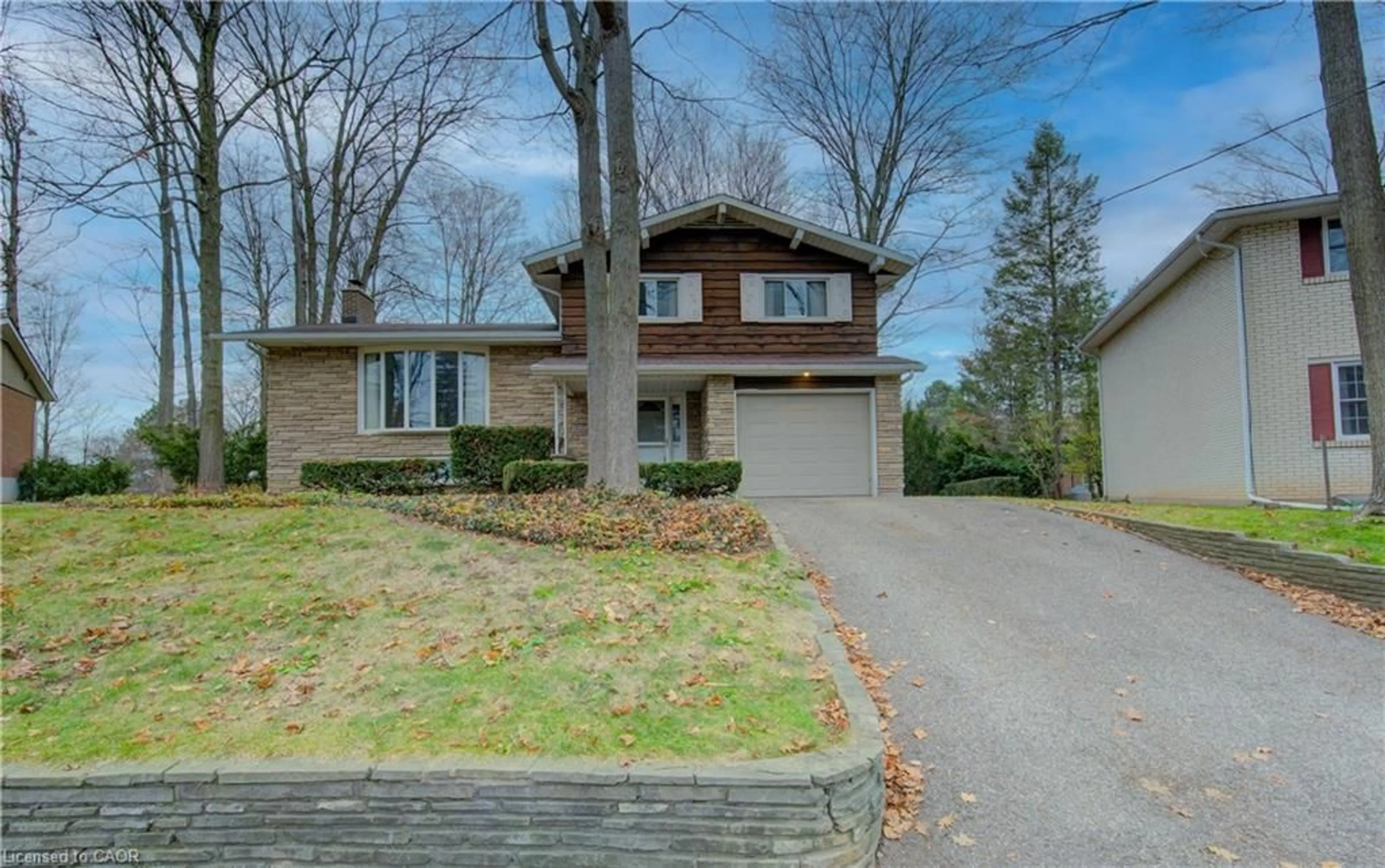 Home with brick exterior material, street for 38 Glenwood Dr, Kitchener Ontario N2A 1H7