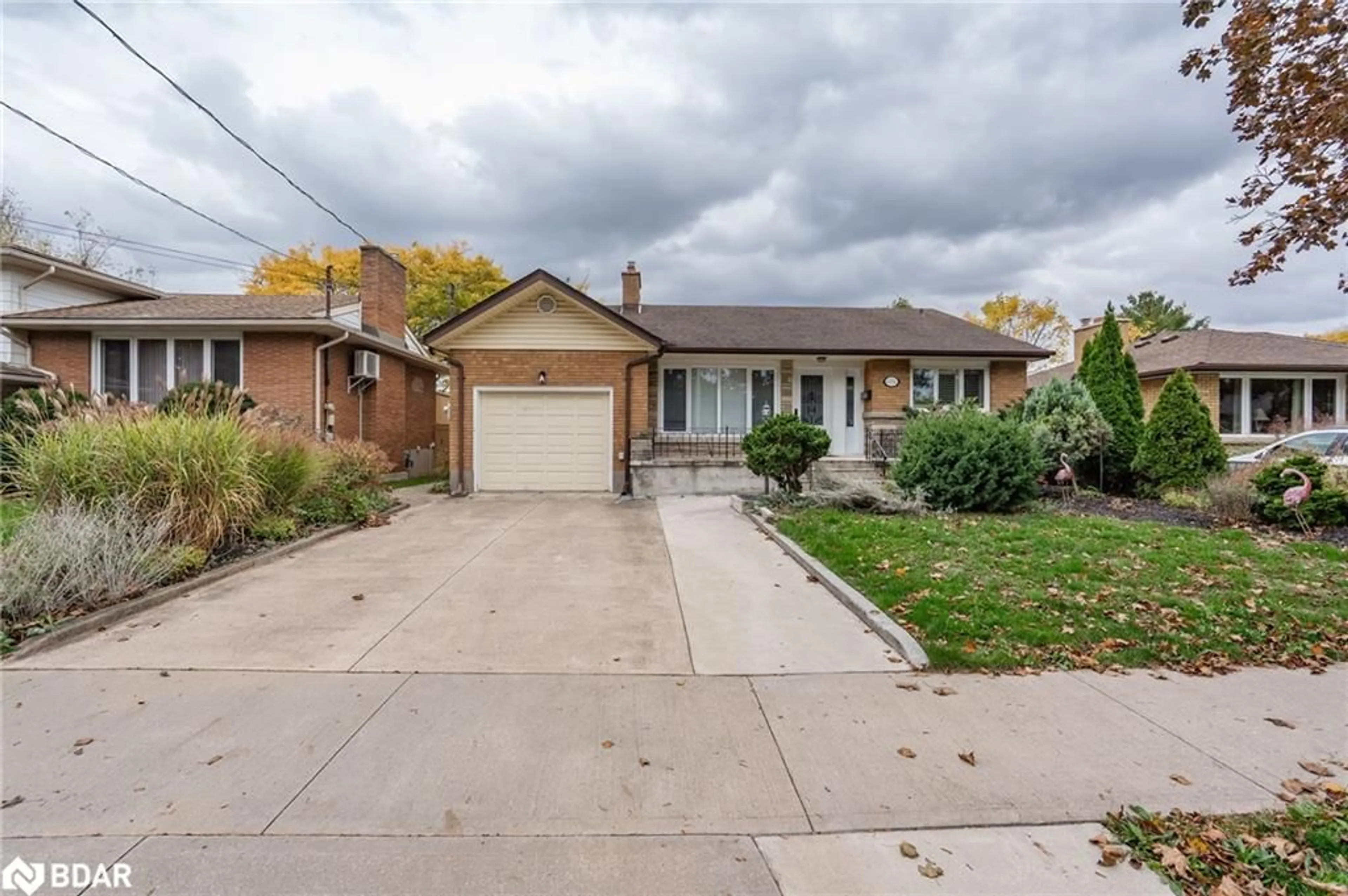 Home with brick exterior material, street for 6256 Balmoral Ave, Niagara Falls Ontario L2E 3A6