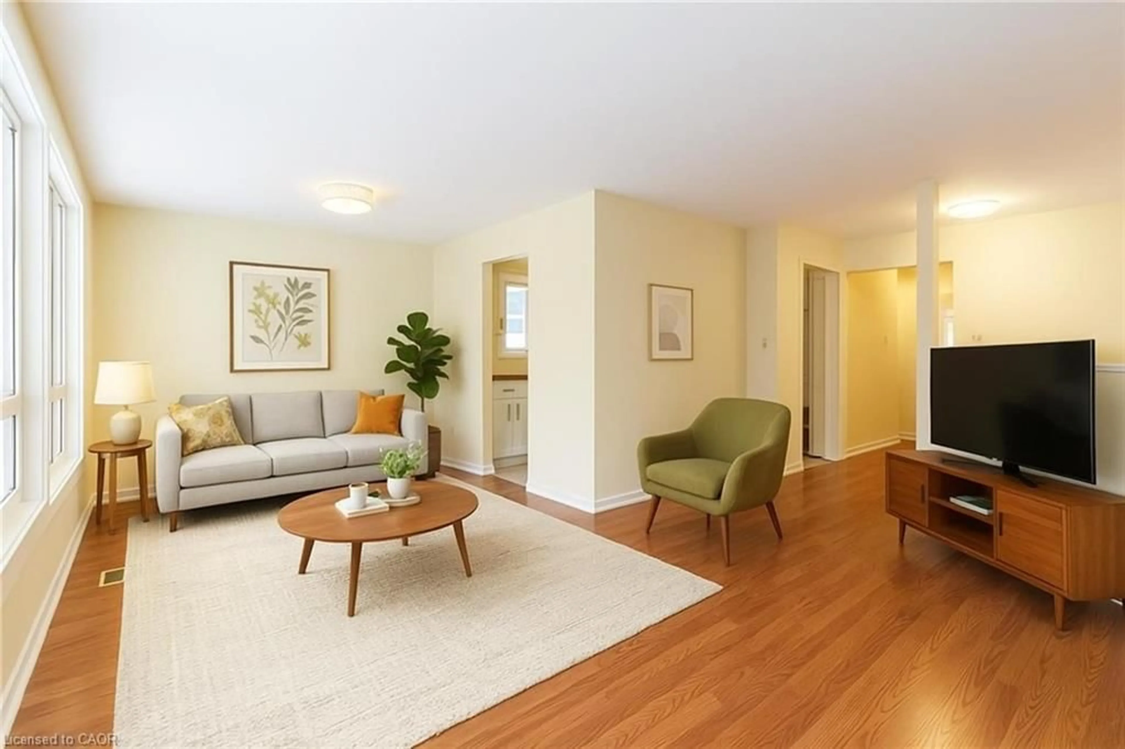 Living room with furniture, wood/laminate floor for 16 Garrow Dr, Hamilton Ontario L9C 6G9