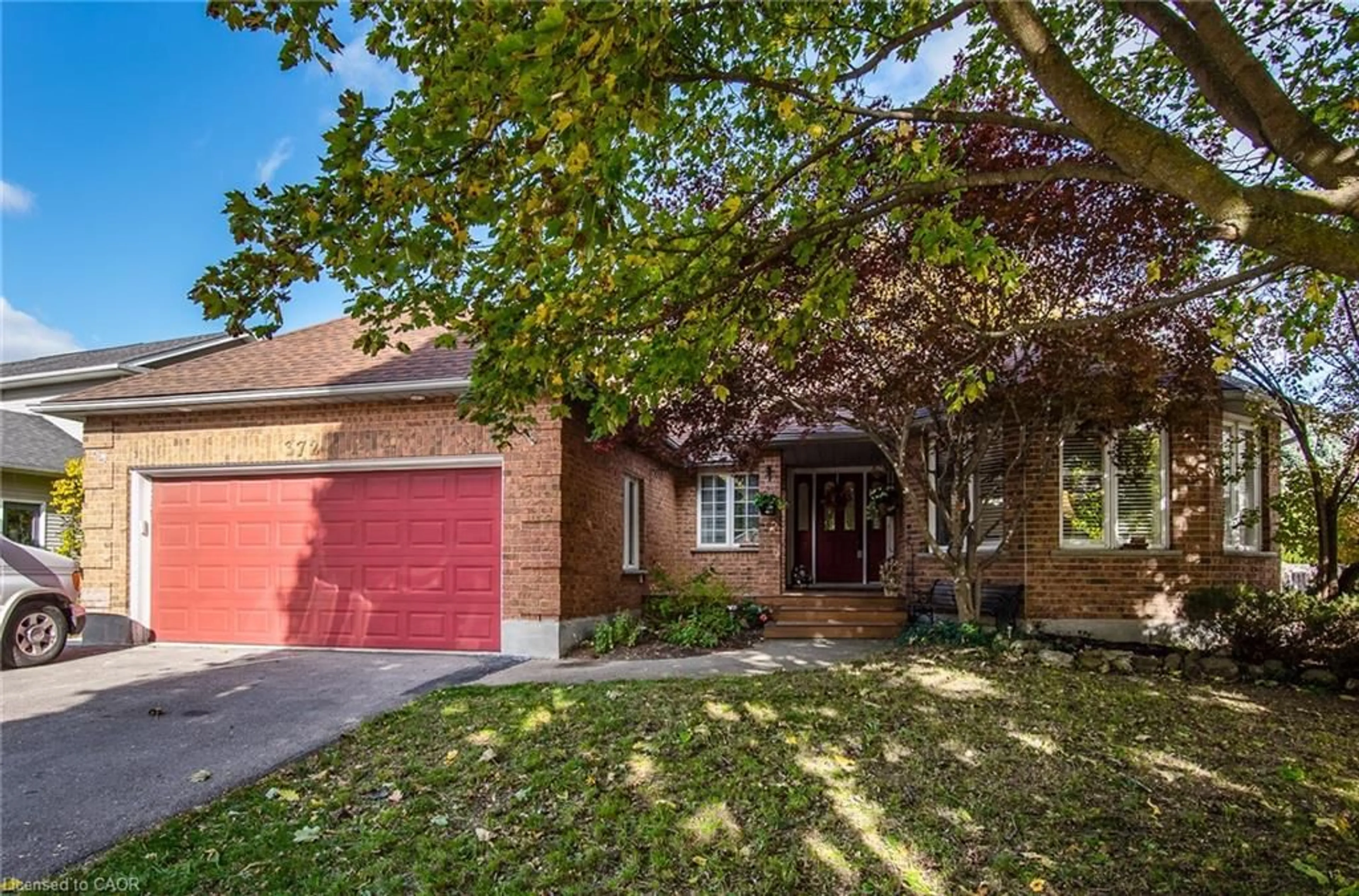 Home with brick exterior material, street for 372 Gatestone Blvd, Waterloo Ontario N2T 2J6