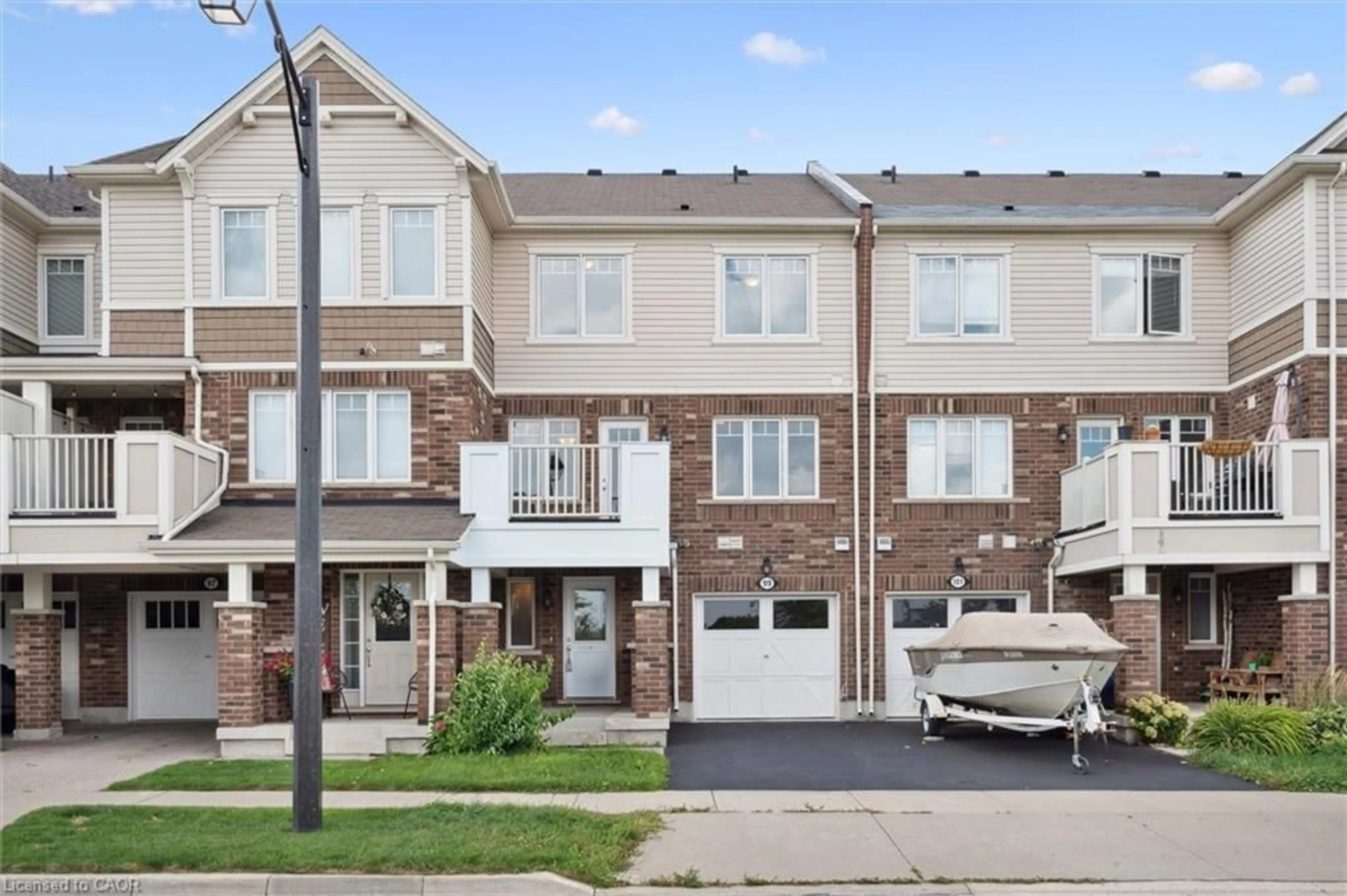 Home with brick exterior material, street for 99 Glenvista Dr, Kitchener Ontario N2R 0E3