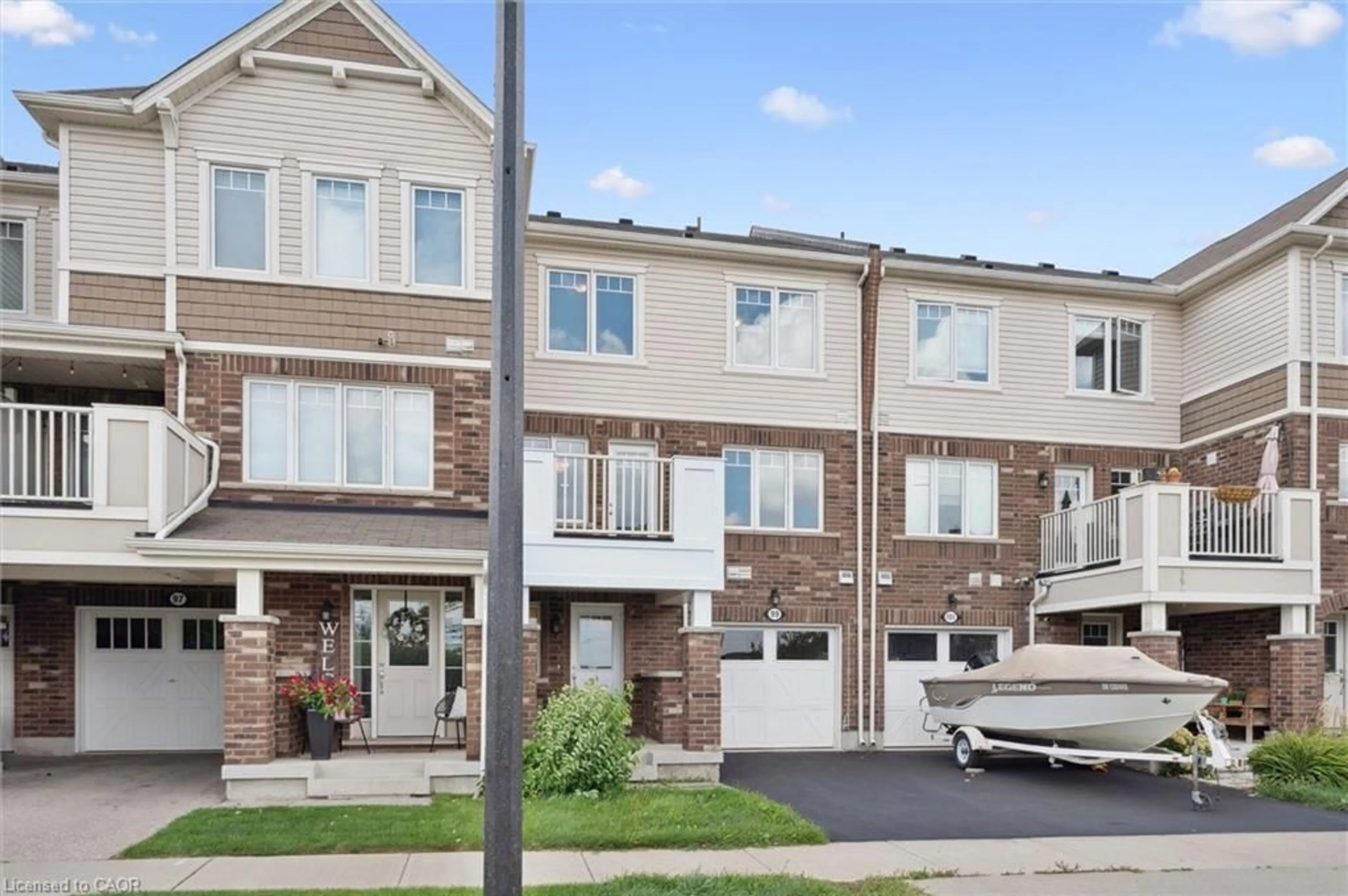 Home with brick exterior material, street for 99 Glenvista Dr, Kitchener Ontario N2R 0E3