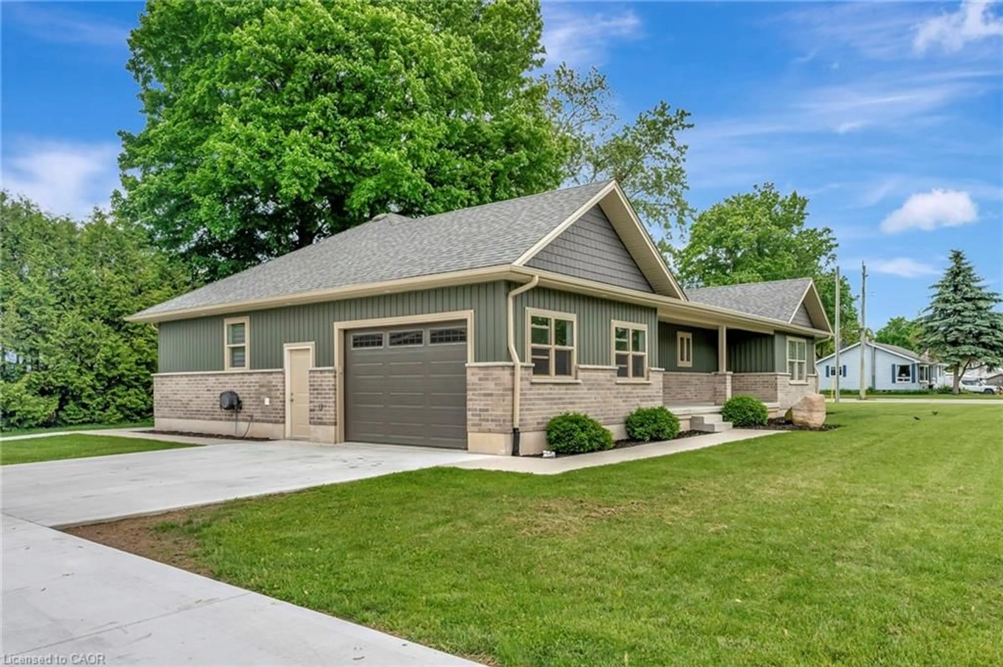 Home with vinyl exterior material, street for 12 Albert St, Langton Ontario N5V 2L8