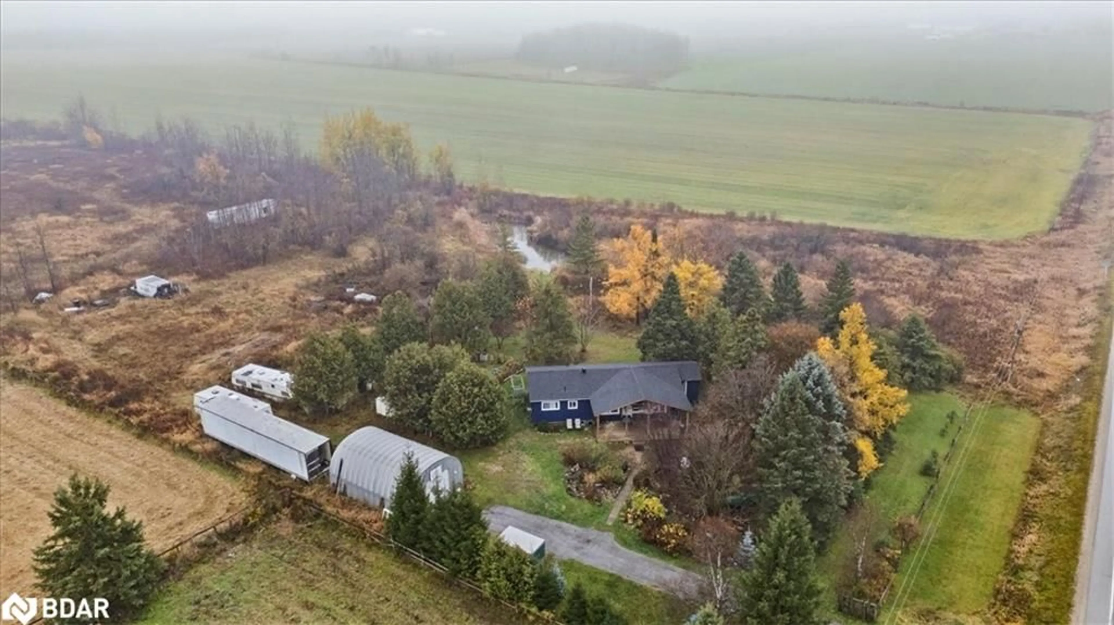 A pic from outside/outdoor area/front of a property/back of a property/a pic from drone, mountain view for 180118 Grey Road 9 Rd, Dundalk Ontario N0C 1B0