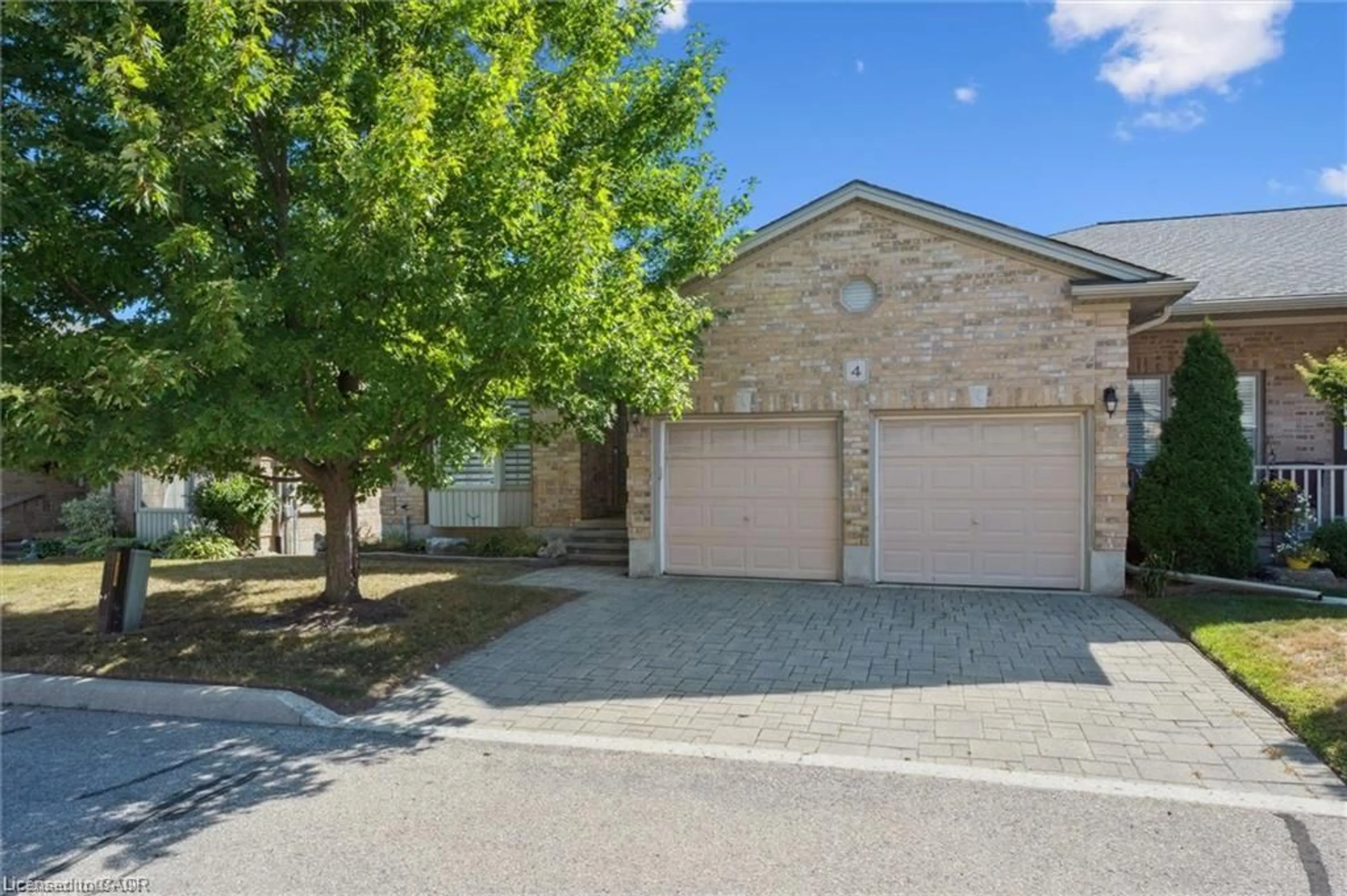 A pic from outside/outdoor area/front of a property/back of a property/a pic from drone, street for 900 Doon Village Rd #4, Kitchener Ontario N2P 1A4