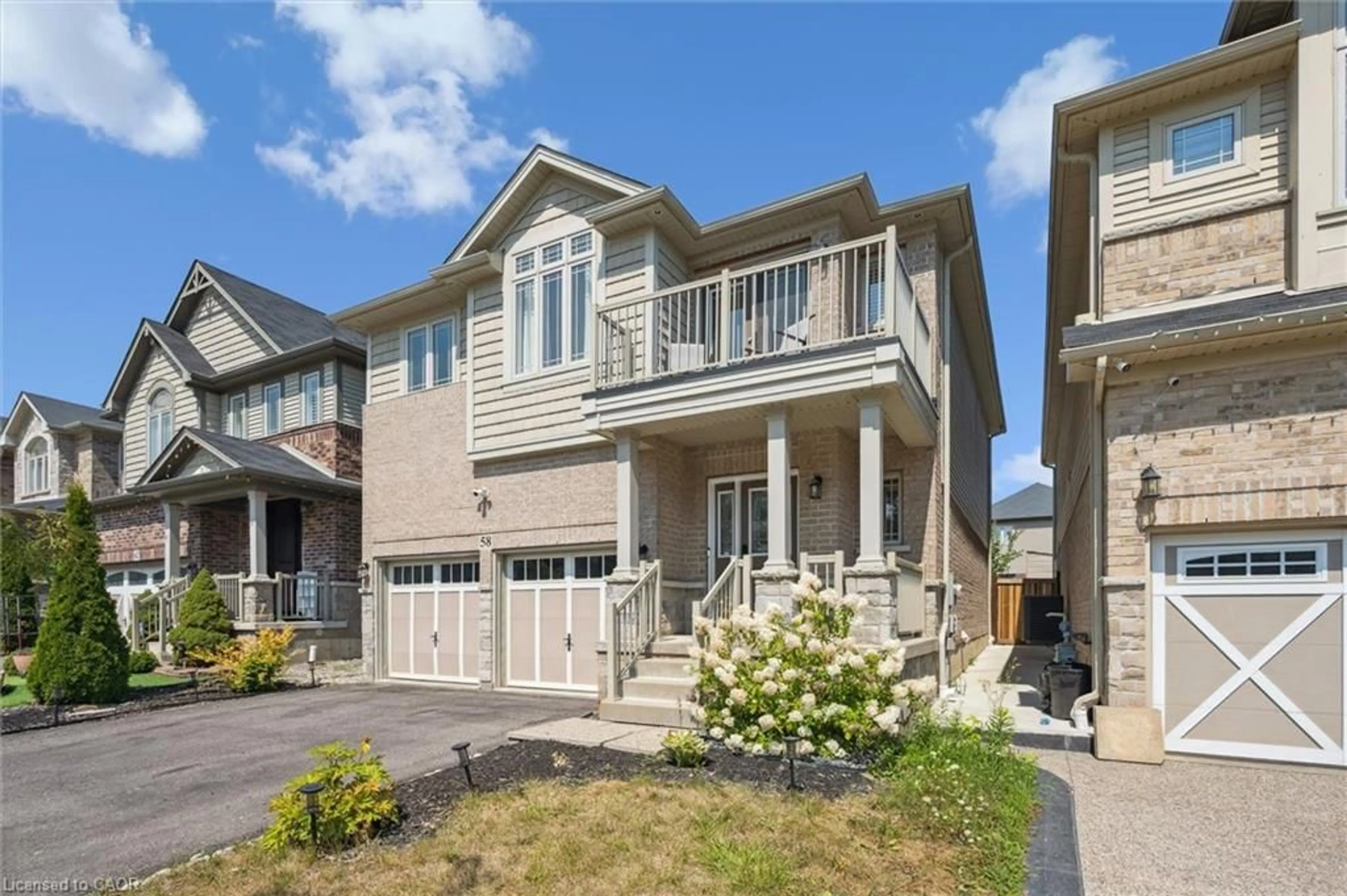 Home with vinyl exterior material, street for 58 Elmbank Trail, Kitchener Ontario N2R 0H1