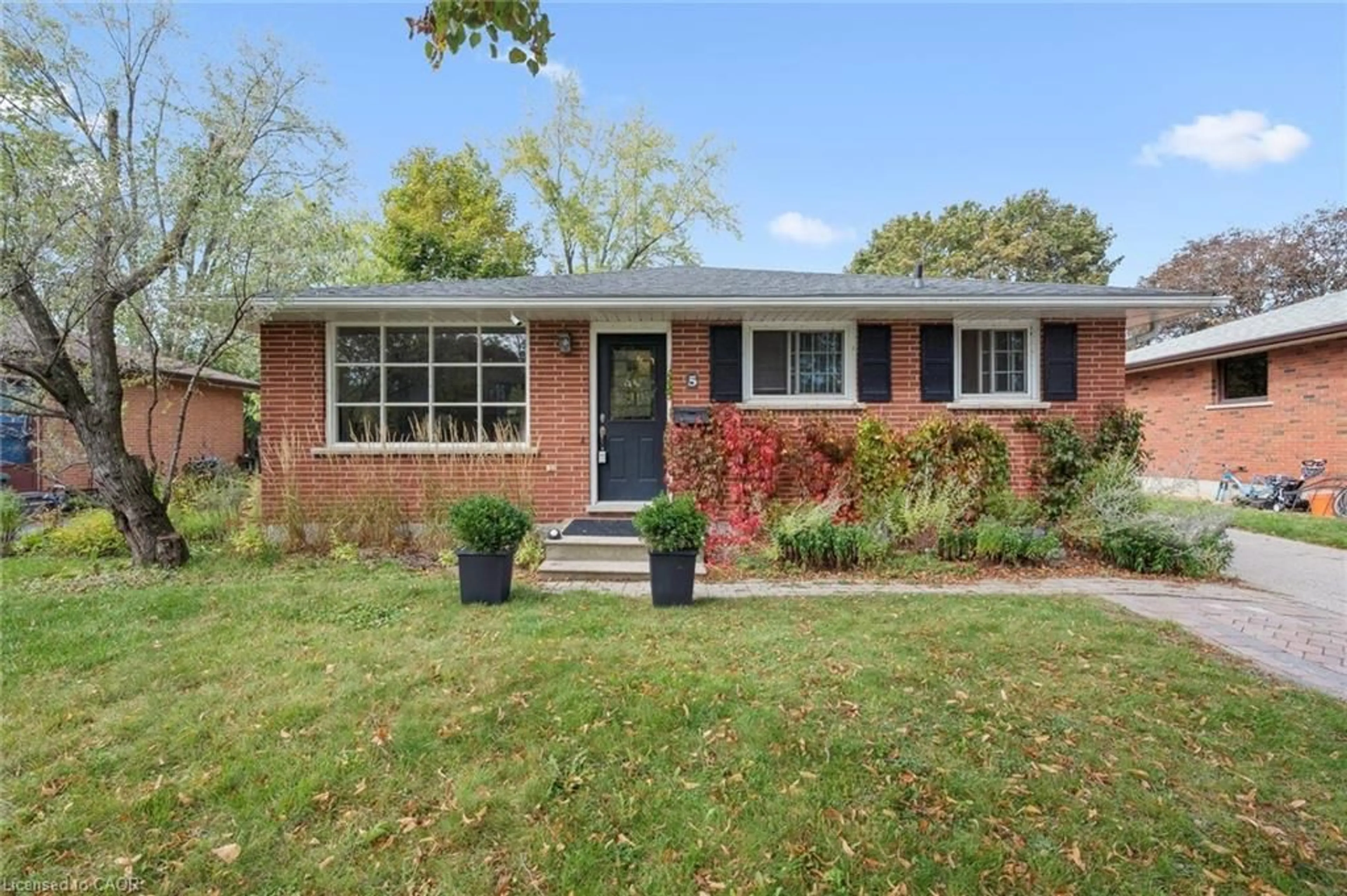 Home with brick exterior material, street for 5 Picadilly Pl, Guelph Ontario N1G 2P8