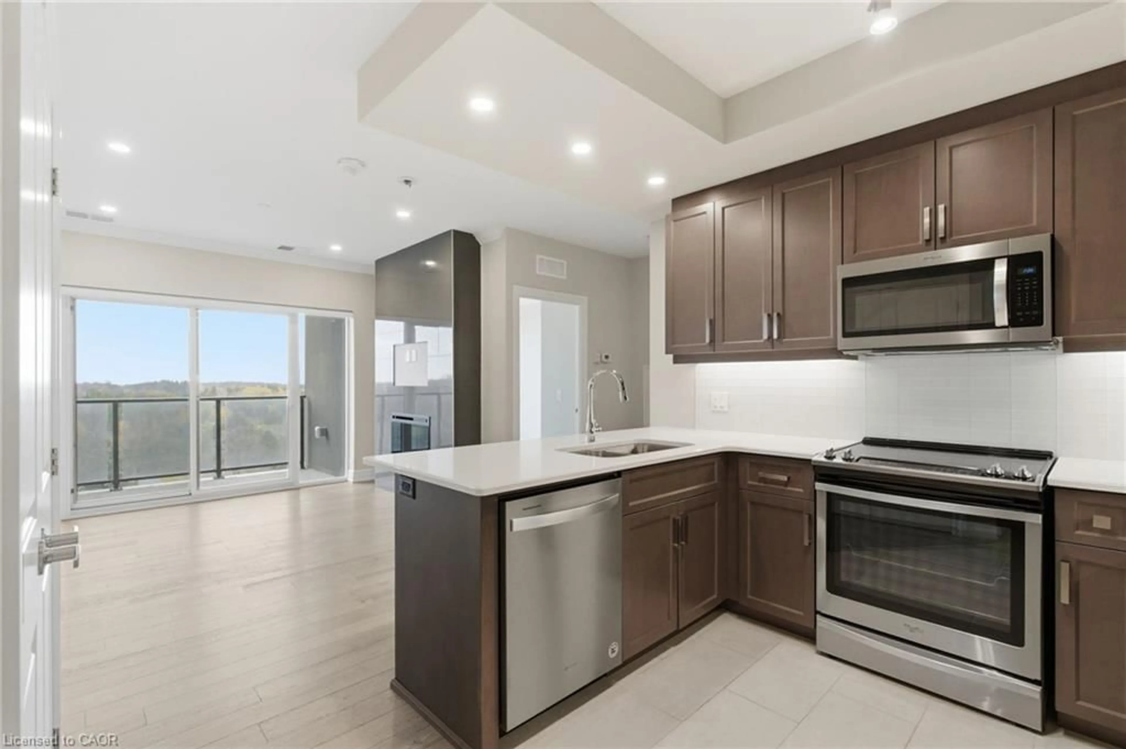 Open concept kitchen, ceramic/tile floor for 1878 Gordon St #814, Guelph Ontario N1L 0P4