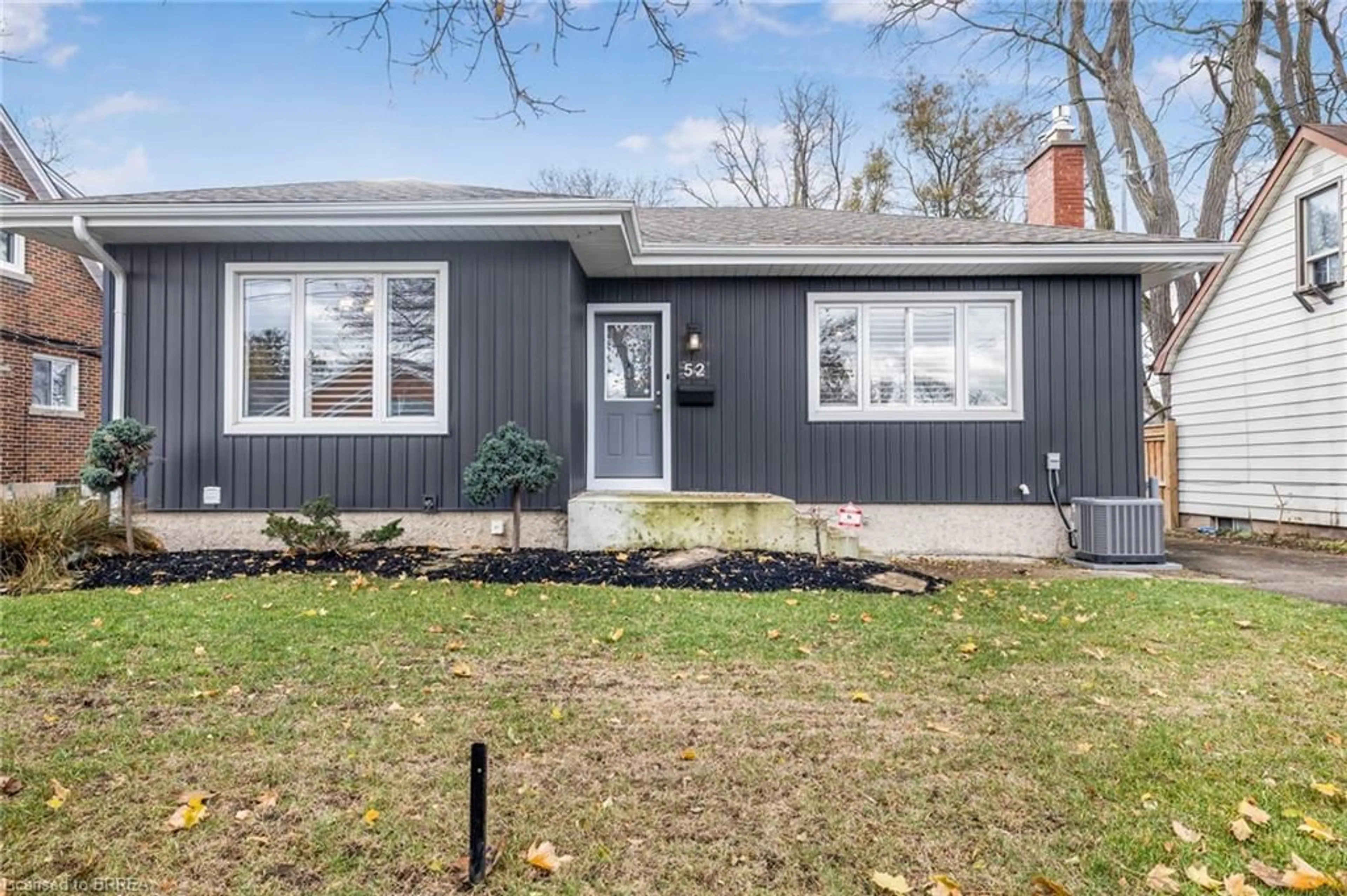 Home with vinyl exterior material, street for 52 Charing Cross St, Brantford Ontario N3R 2H3