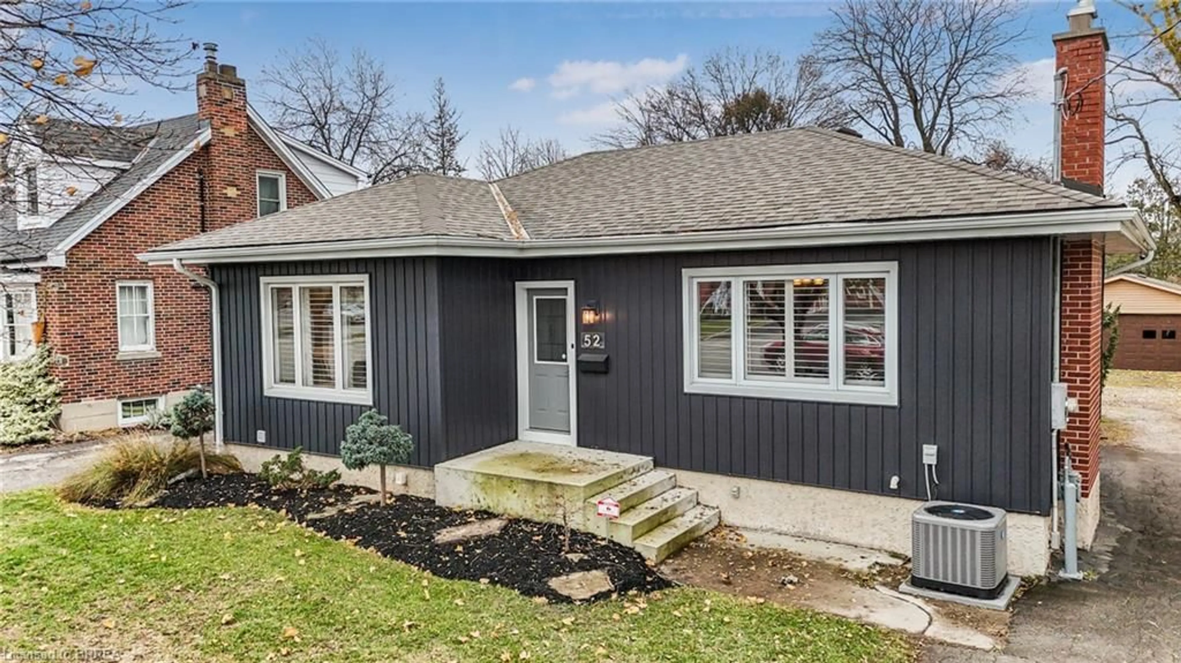 Home with vinyl exterior material, street for 52 Charing Cross St, Brantford Ontario N3R 2H3