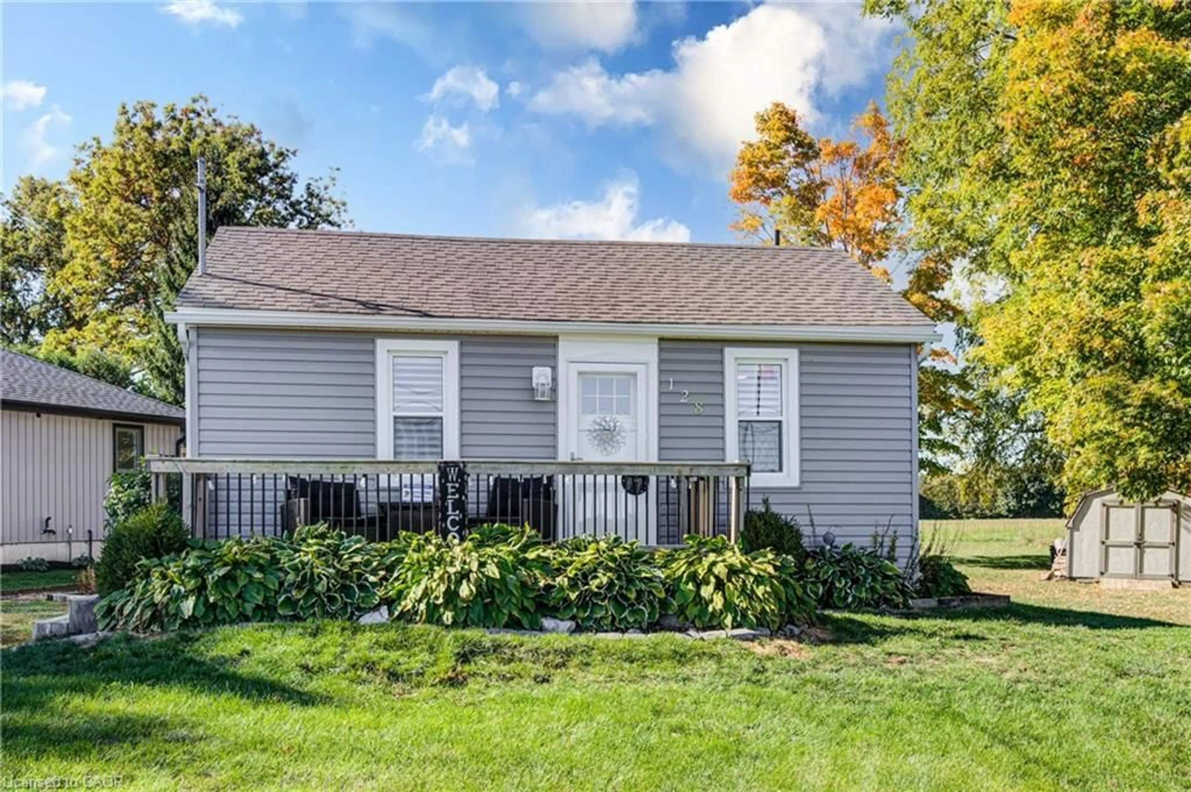 Home with vinyl exterior material, street for 128 Dover St, Otterville Ontario N4S 3M1