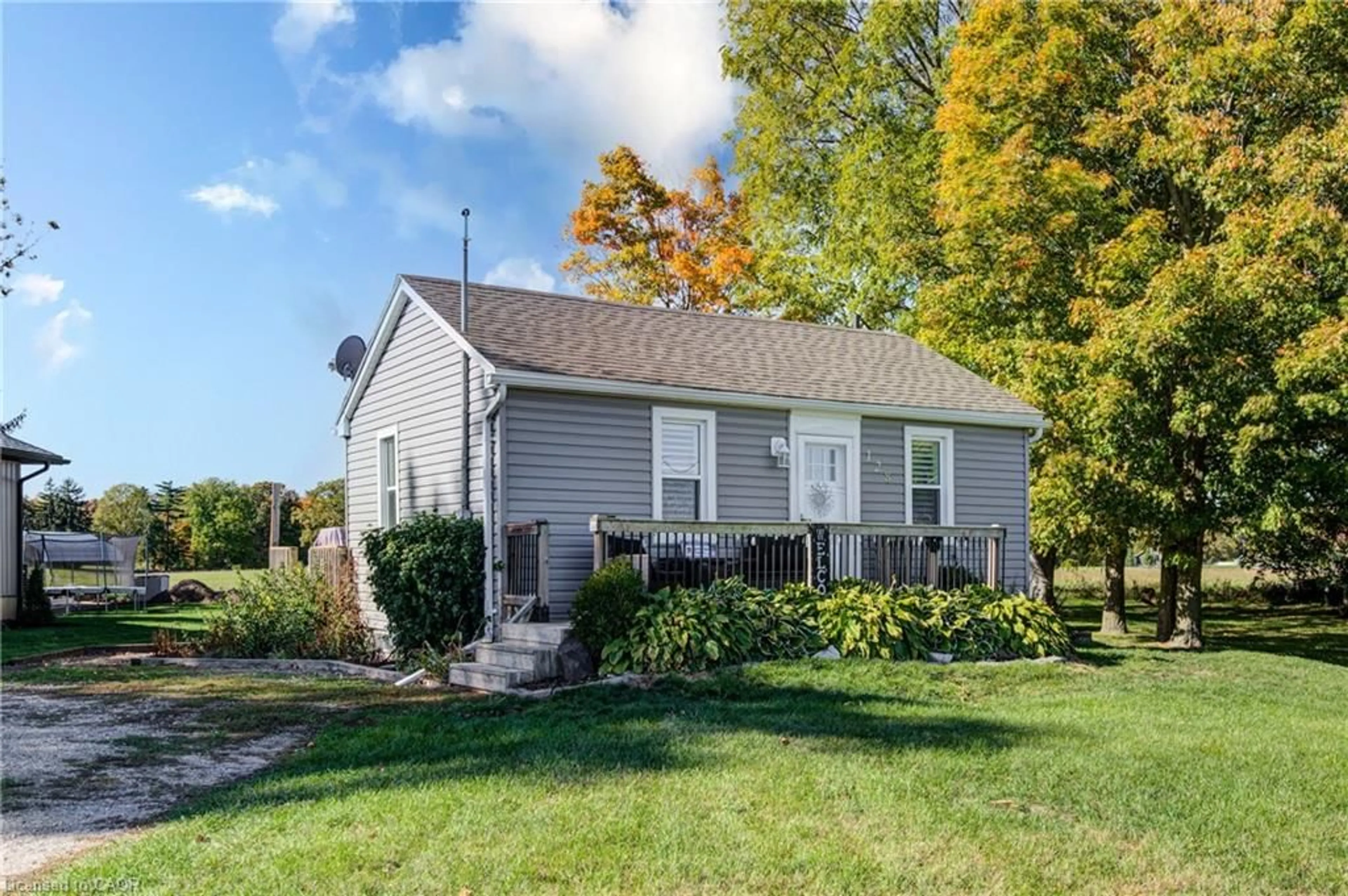 Home with vinyl exterior material, street for 128 Dover St, Otterville Ontario N4S 3M1