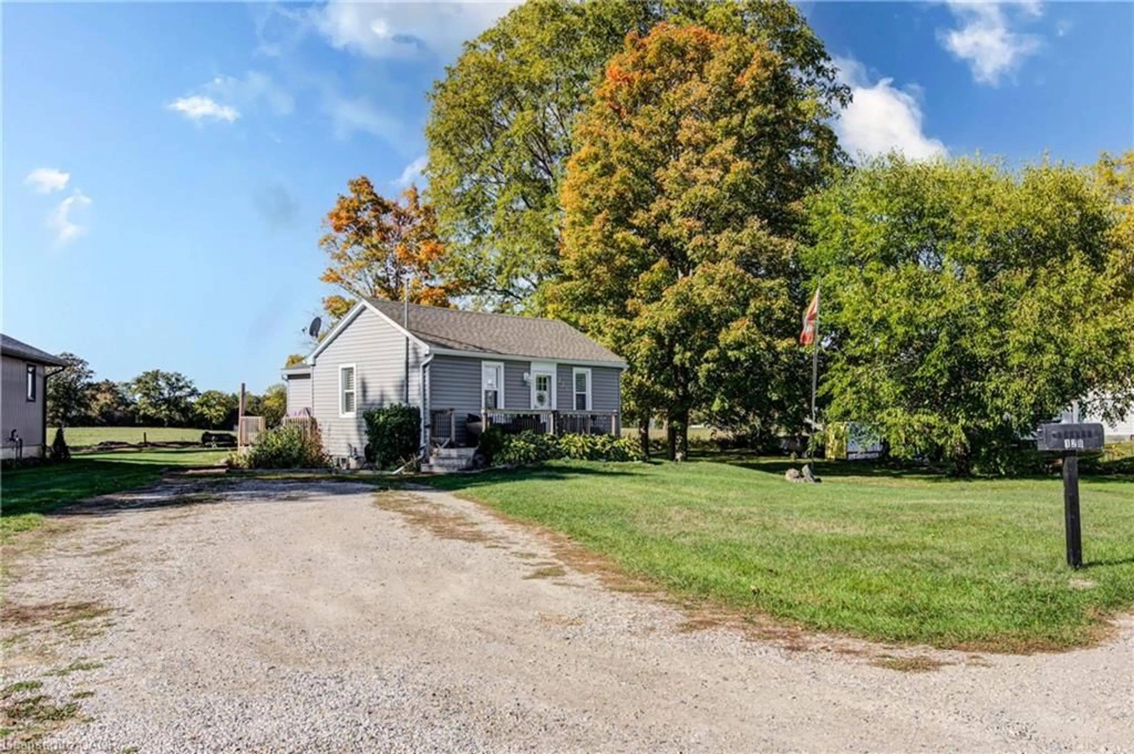 A pic from outside/outdoor area/front of a property/back of a property/a pic from drone, street for 128 Dover St, Otterville Ontario N4S 3M1