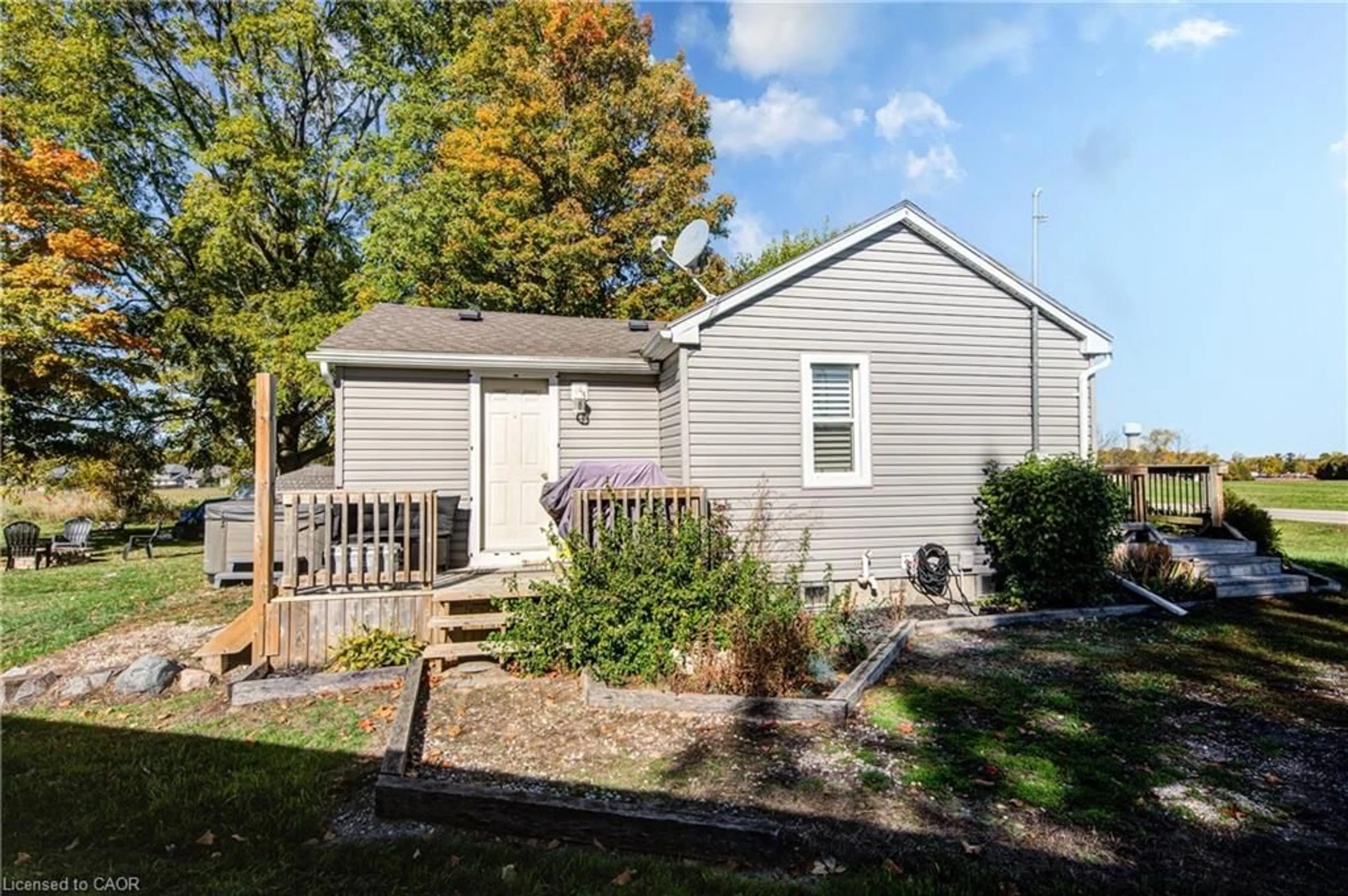 Home with vinyl exterior material, street for 128 Dover St, Otterville Ontario N4S 3M1