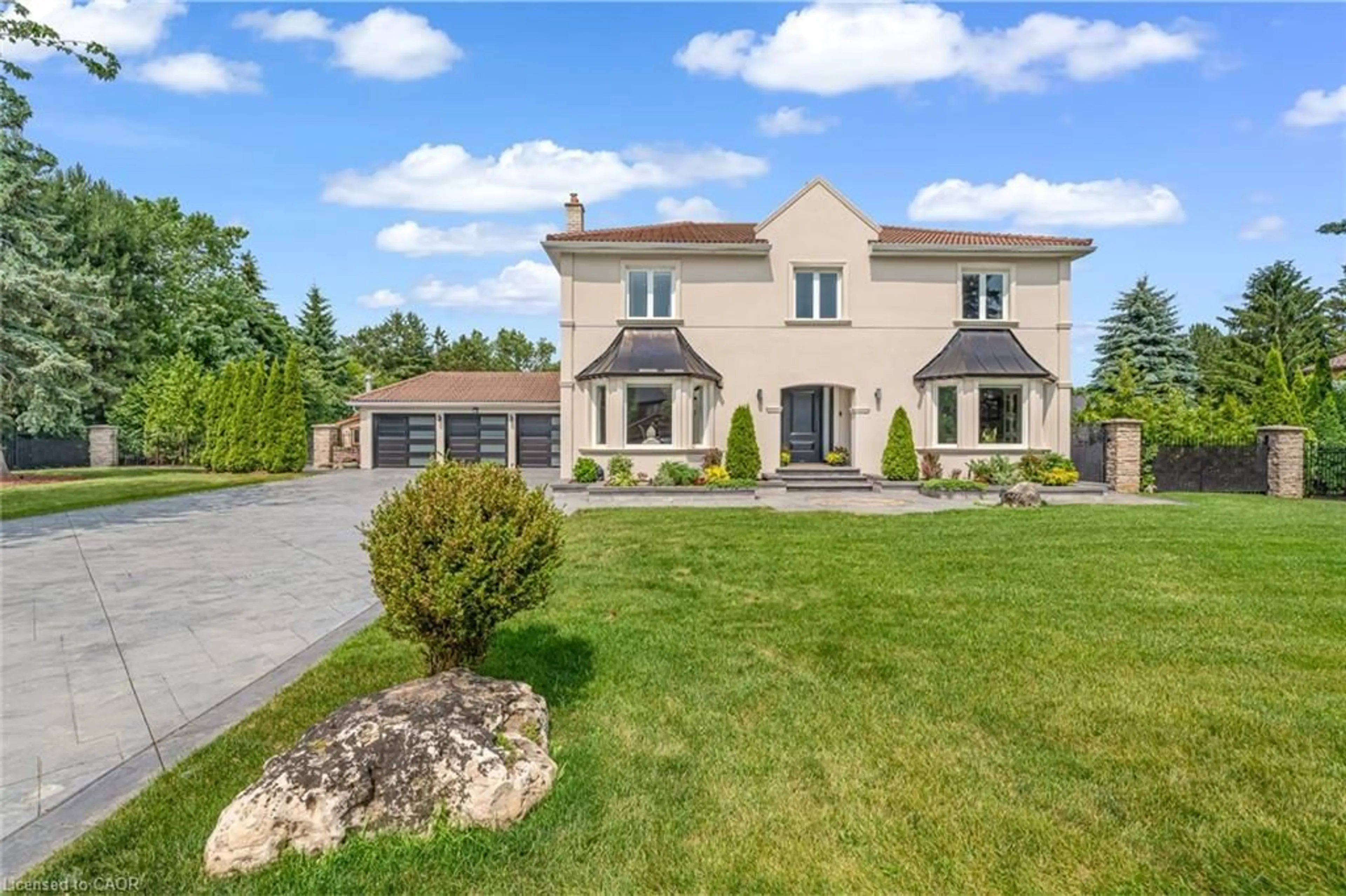 Home with brick exterior material, street for 96 Kenpark Ave, Brampton Ontario L6Z 3K4