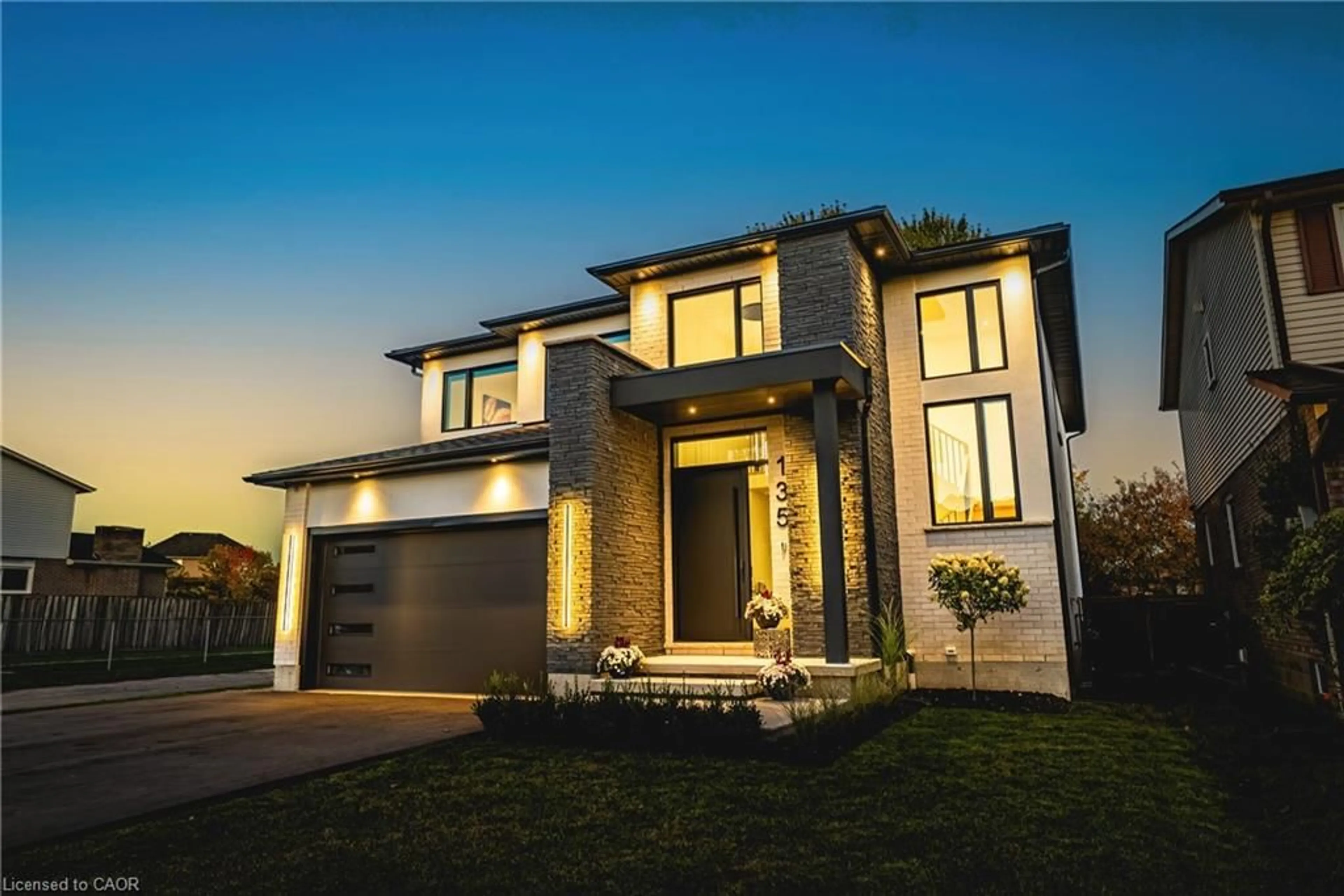 Home with brick exterior material, street for 135 Eleanor Ave, Hamilton Ontario L8W 1C7