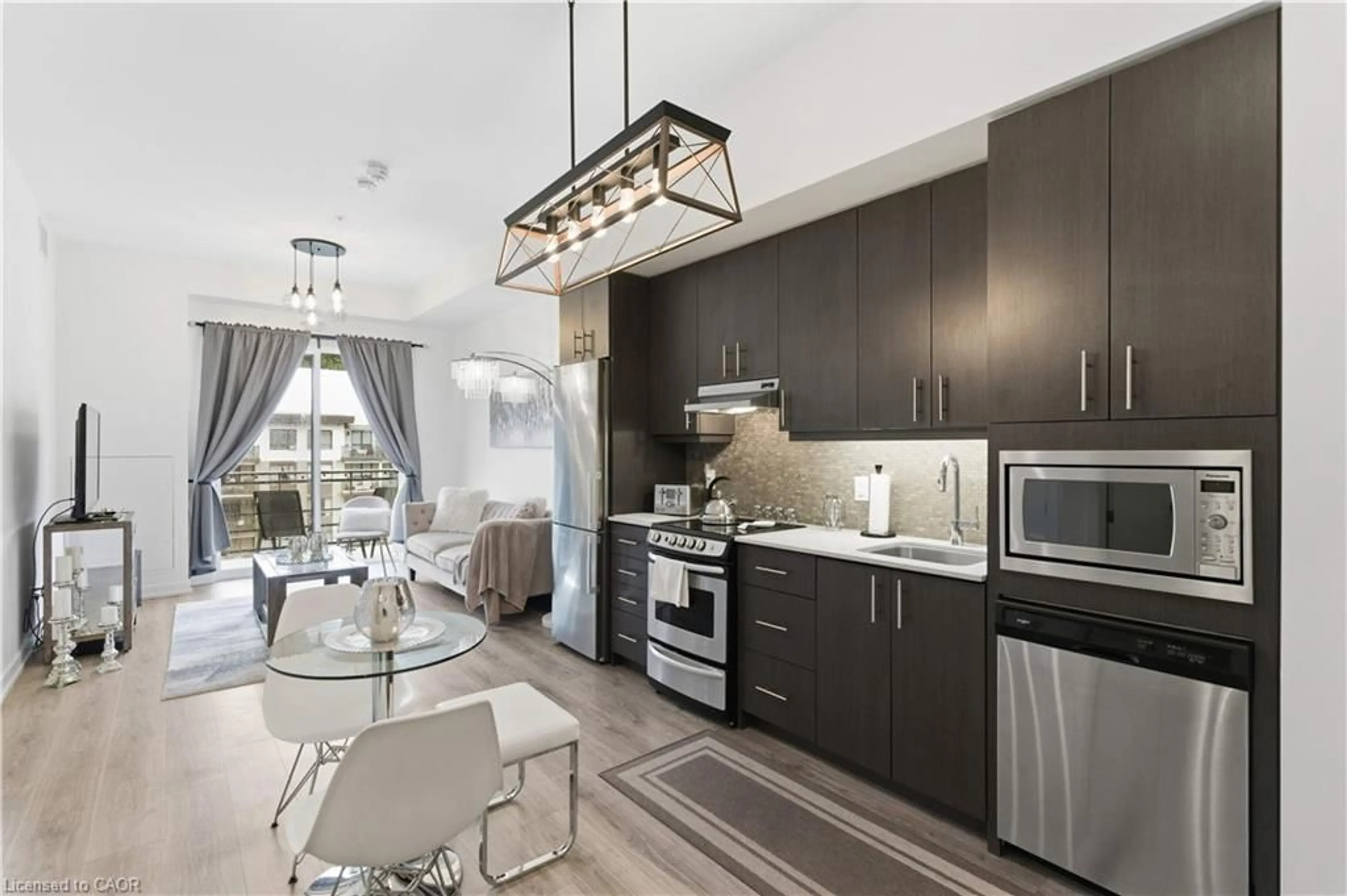 Open concept kitchen, ceramic/tile floor for 10 Esplanade Lane #616, Grimsby Ontario L3M 0H1