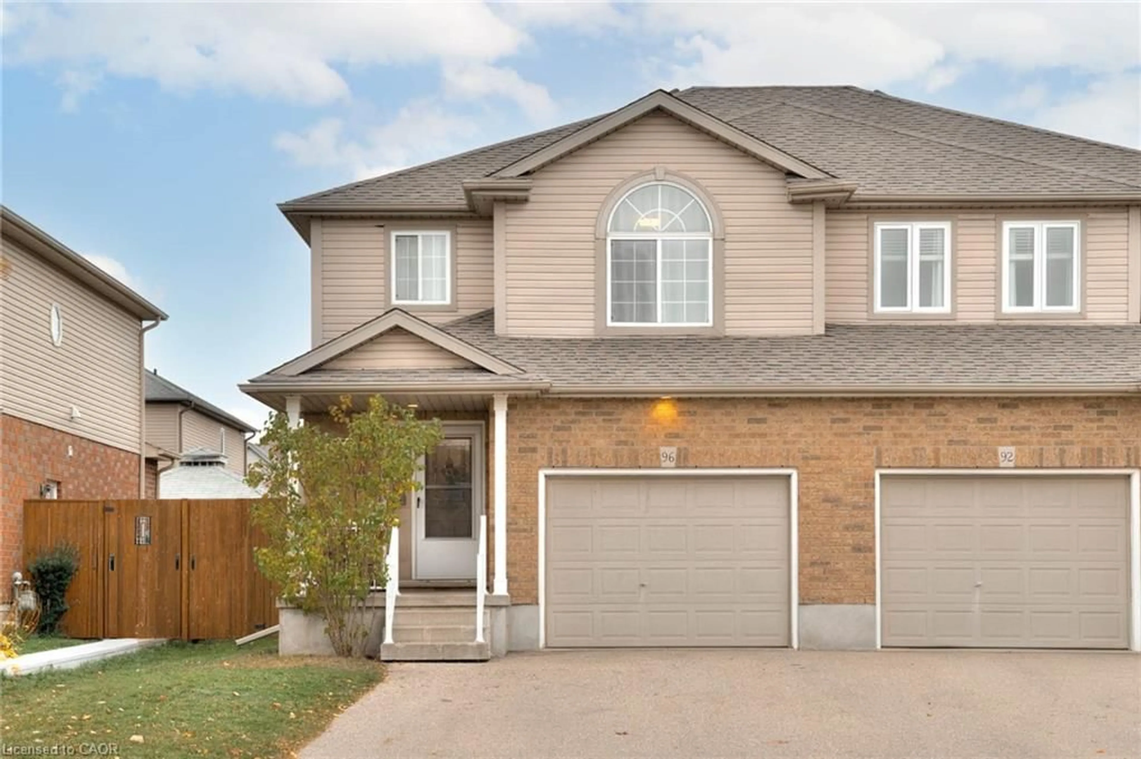 Home with brick exterior material, street for 96 Raising Mill Gate, Elmira Ontario N3B 3N7