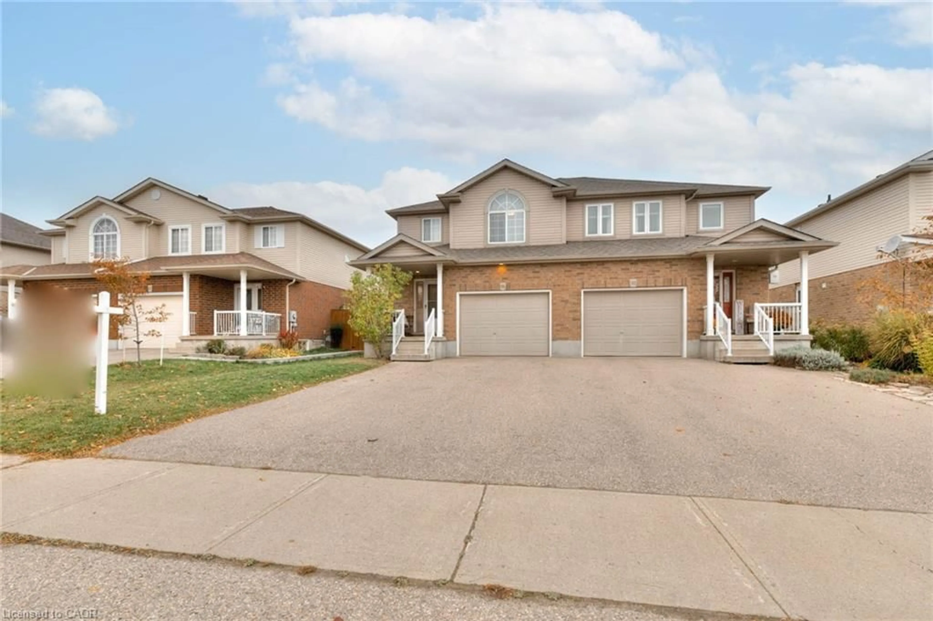 Home with brick exterior material, street for 96 Raising Mill Gate, Elmira Ontario N3B 3N7