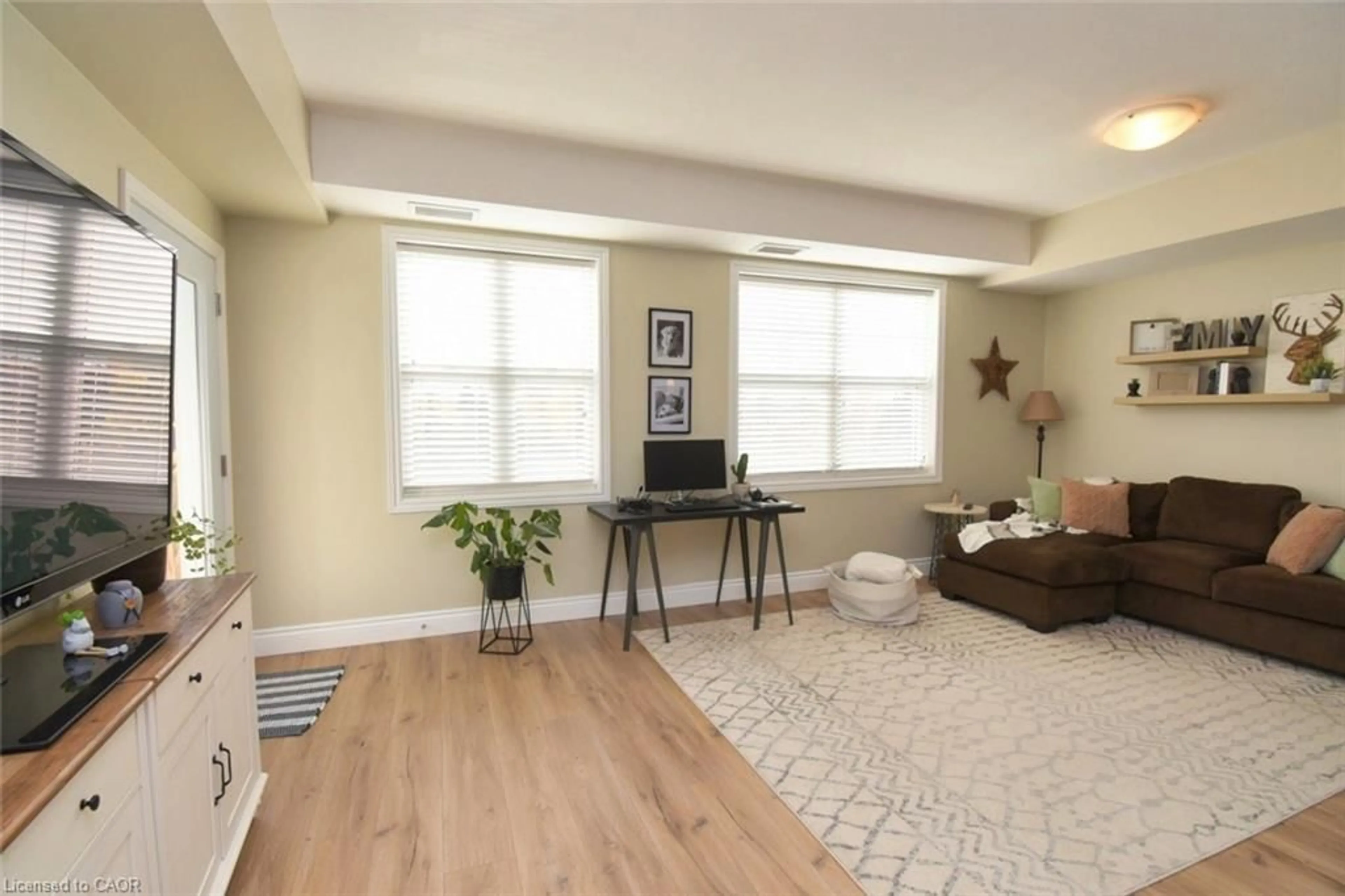 Living room with furniture, unknown for 67 Haddington St #306, Caledonia Ontario N3W 2H2