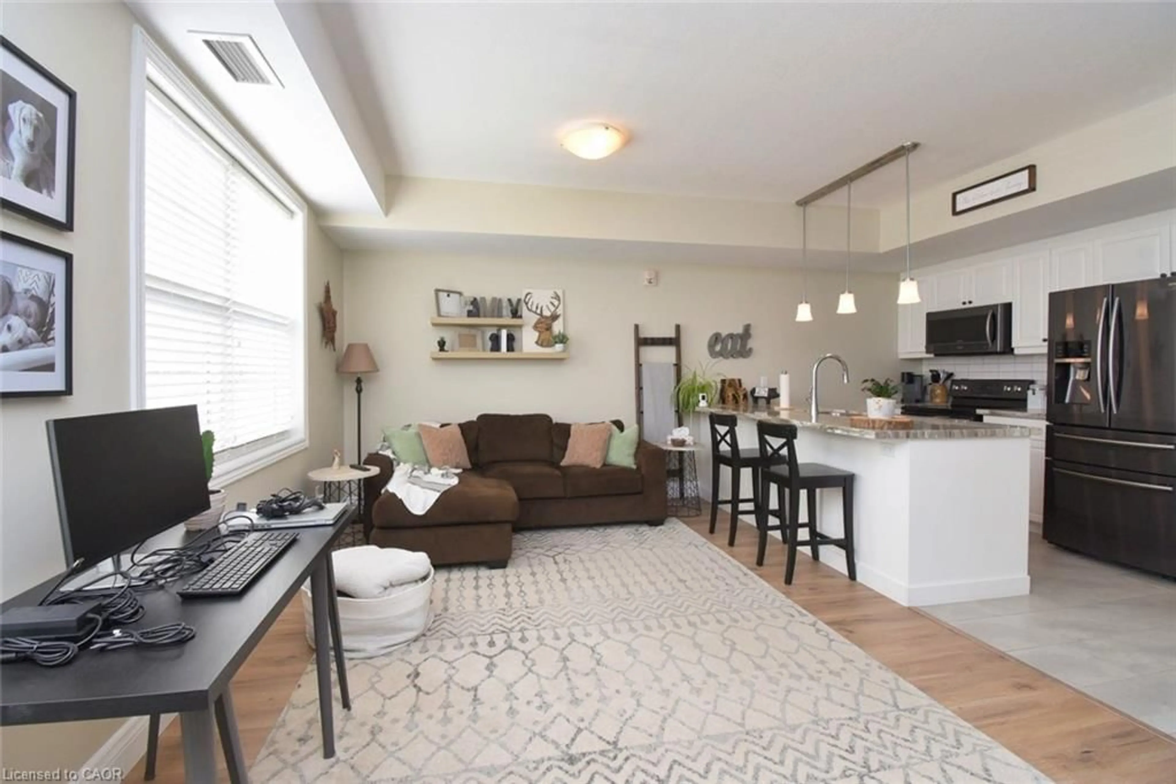 Living room with furniture, unknown for 67 Haddington St #306, Caledonia Ontario N3W 2H2