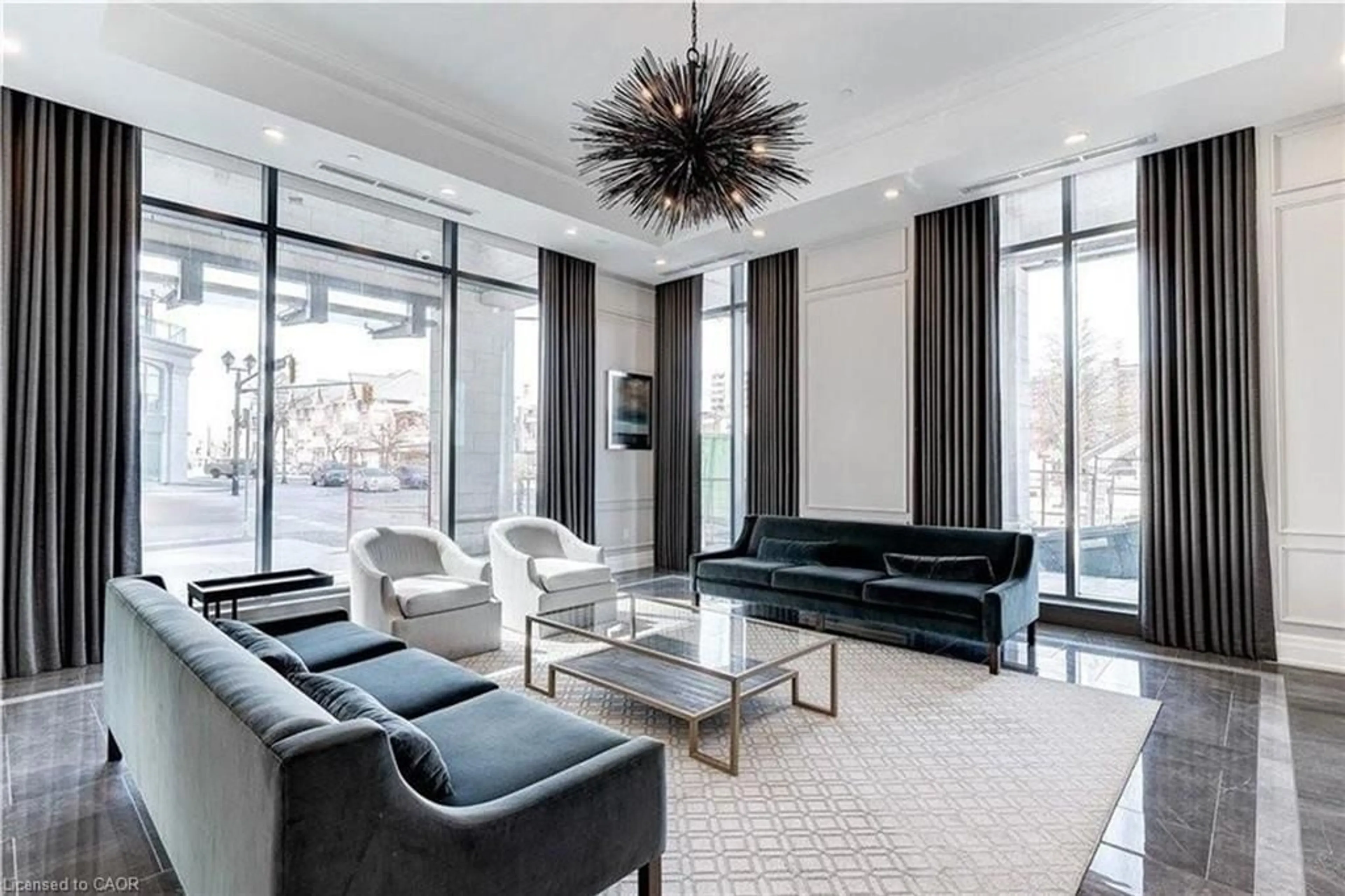 Living room with furniture, unknown for 2060 Lakeshore Rd #308, Burlington Ontario L7R 0G2