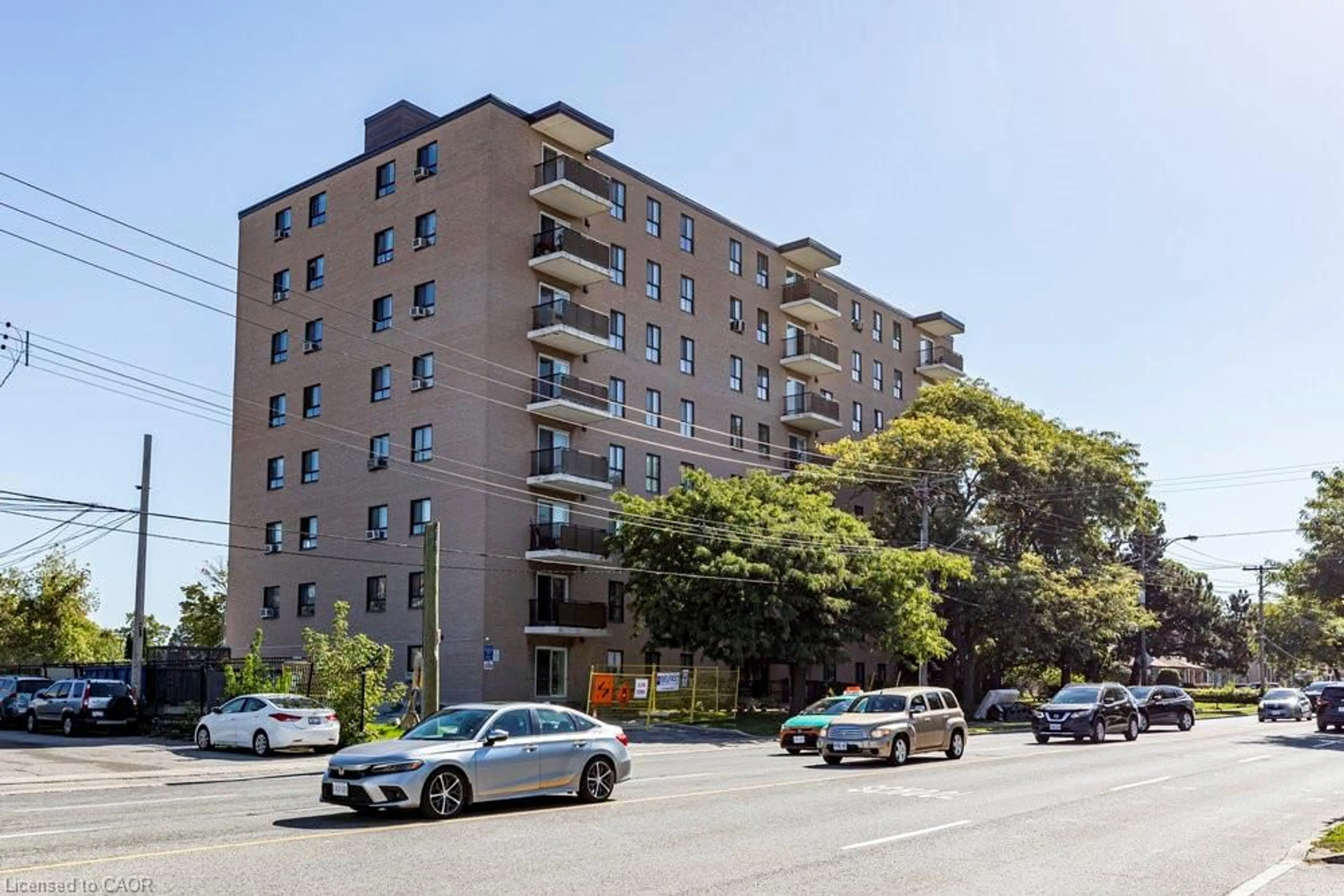 A pic from outside/outdoor area/front of a property/back of a property/a pic from drone, street for 1101 Pharmacy Ave #503, Scarborough Ontario M1R 2H2