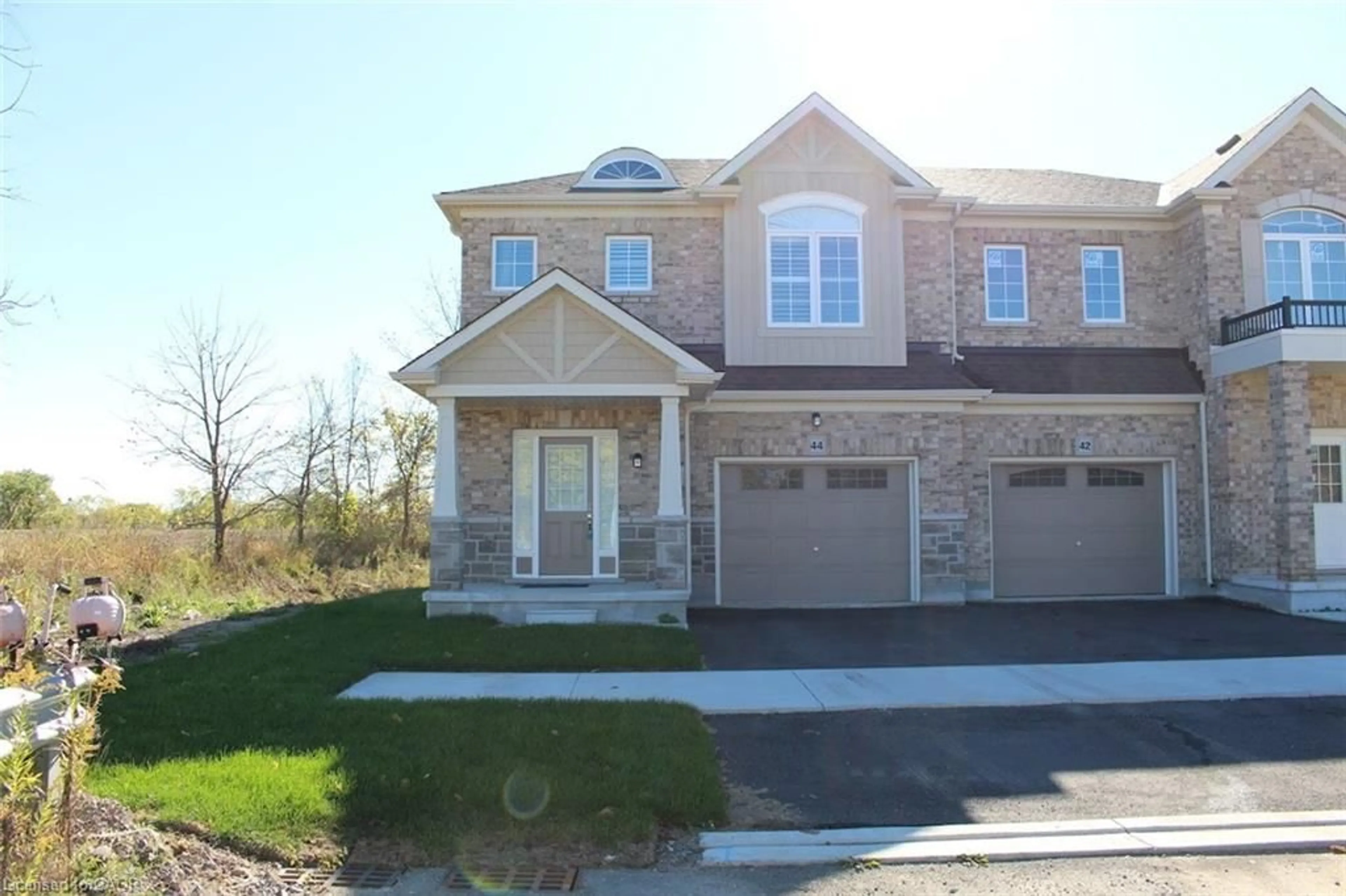 Home with brick exterior material, street for 44 Mccurdy Ave, Waterdown Ontario L8B 0T5