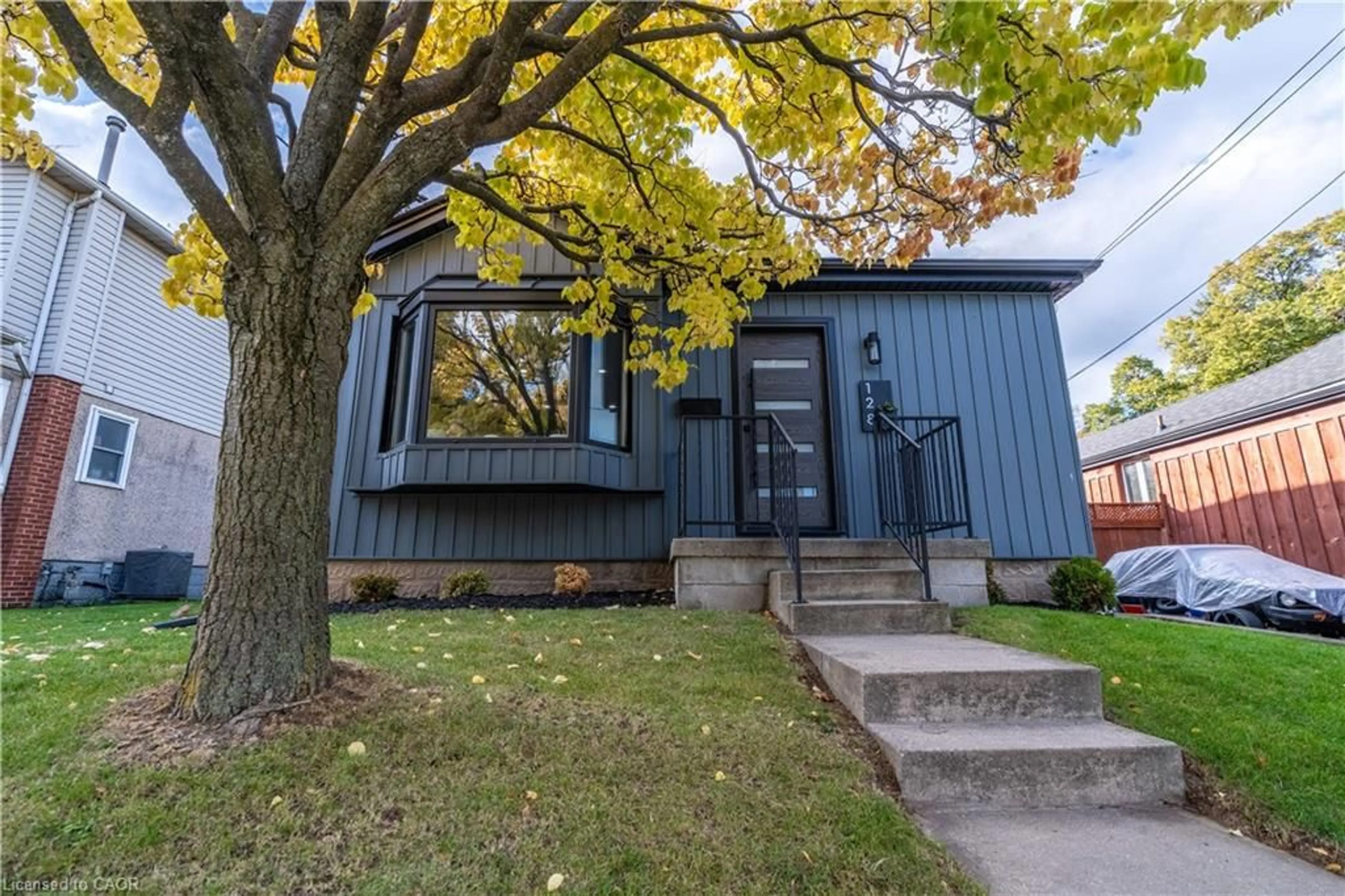 Home with vinyl exterior material, street for 128 East 17th St, Hamilton Ontario L9A 4M5