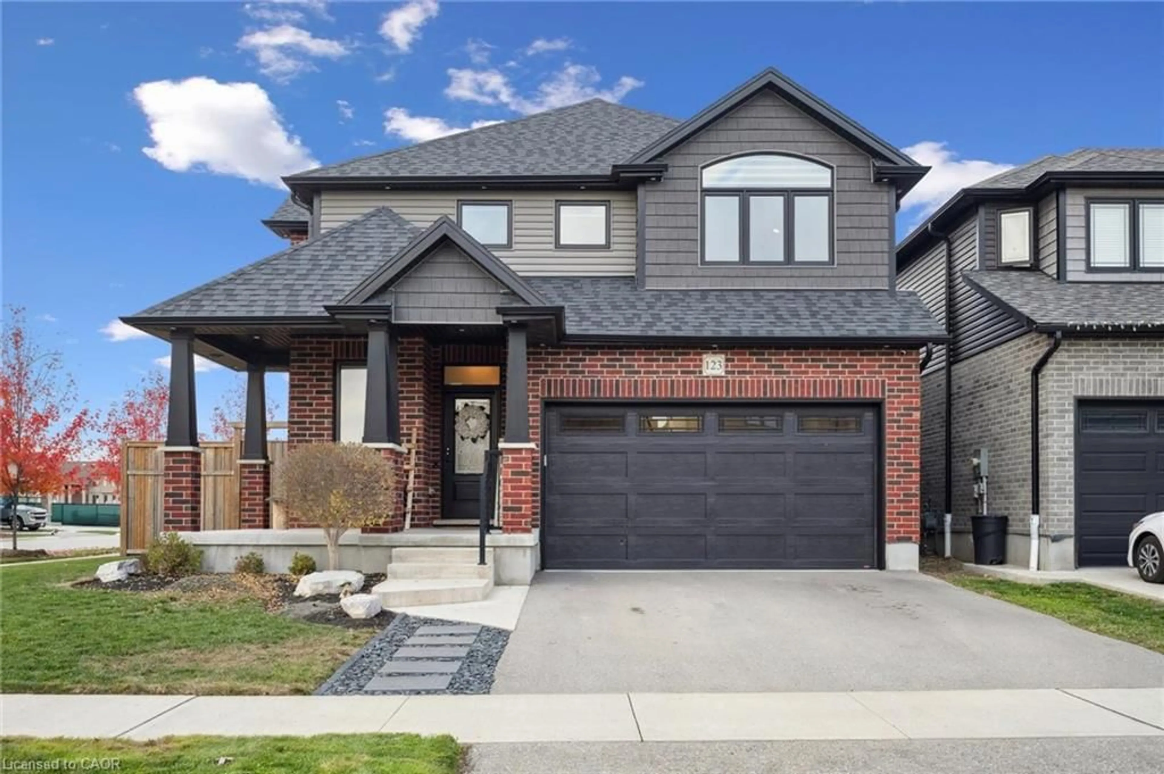 Home with brick exterior material, street for 123 Tristan Cres, Breslau Ontario N0B 1M0