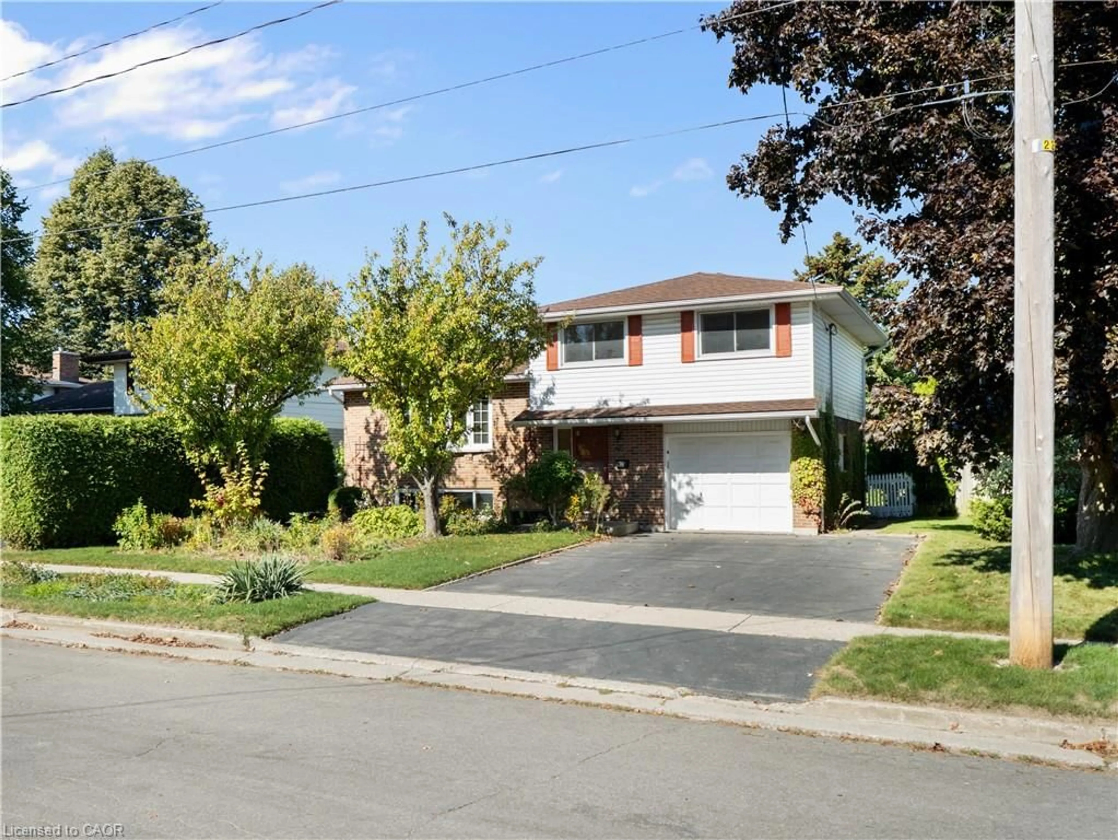 Home with vinyl exterior material, street for 48 Glenbrook Dr, Guelph Ontario N1E 1A9