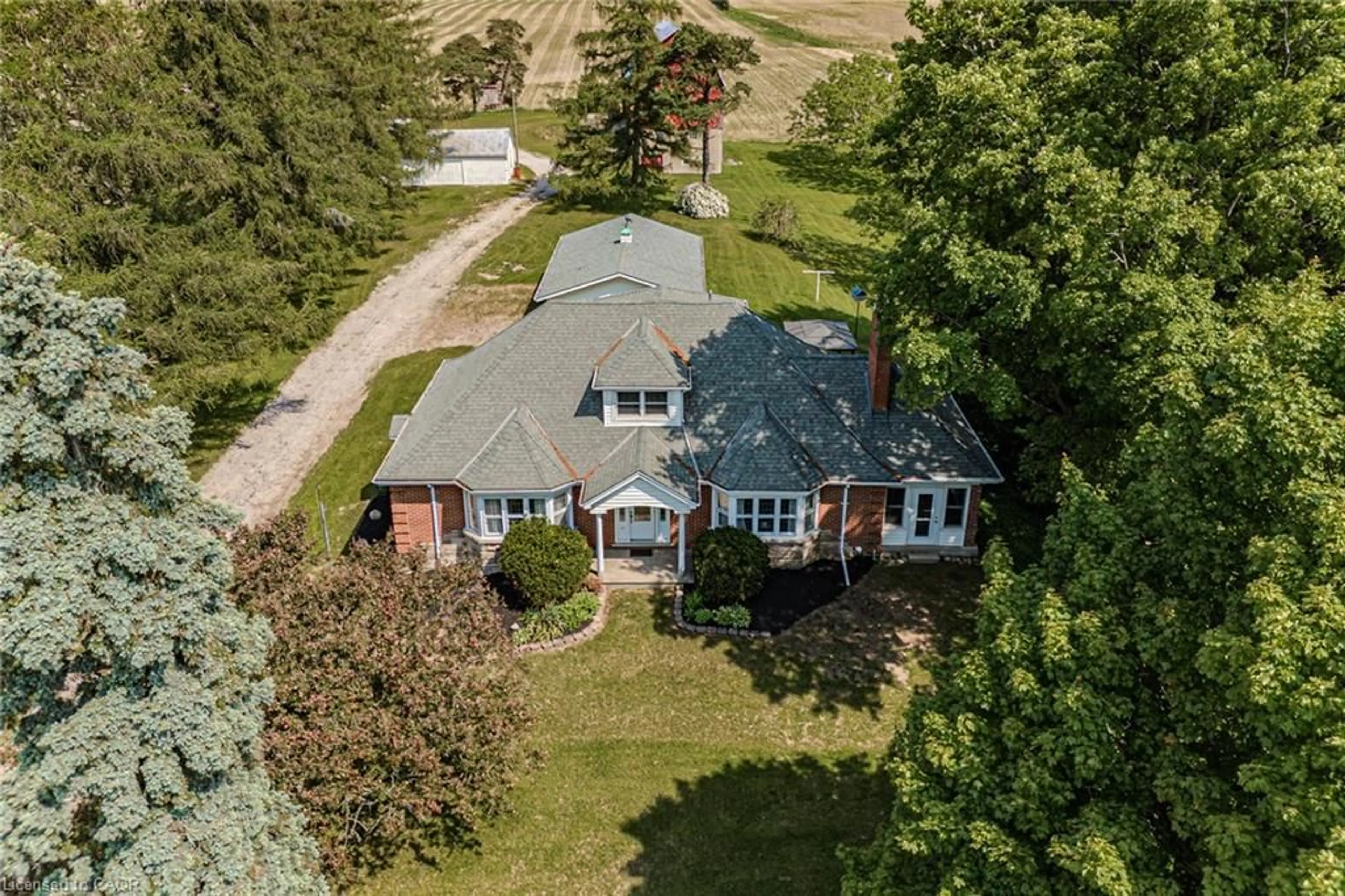 A pic from outside/outdoor area/front of a property/back of a property/a pic from drone, street for 573 Highway 6, Port Dover Ontario N0A 1N2