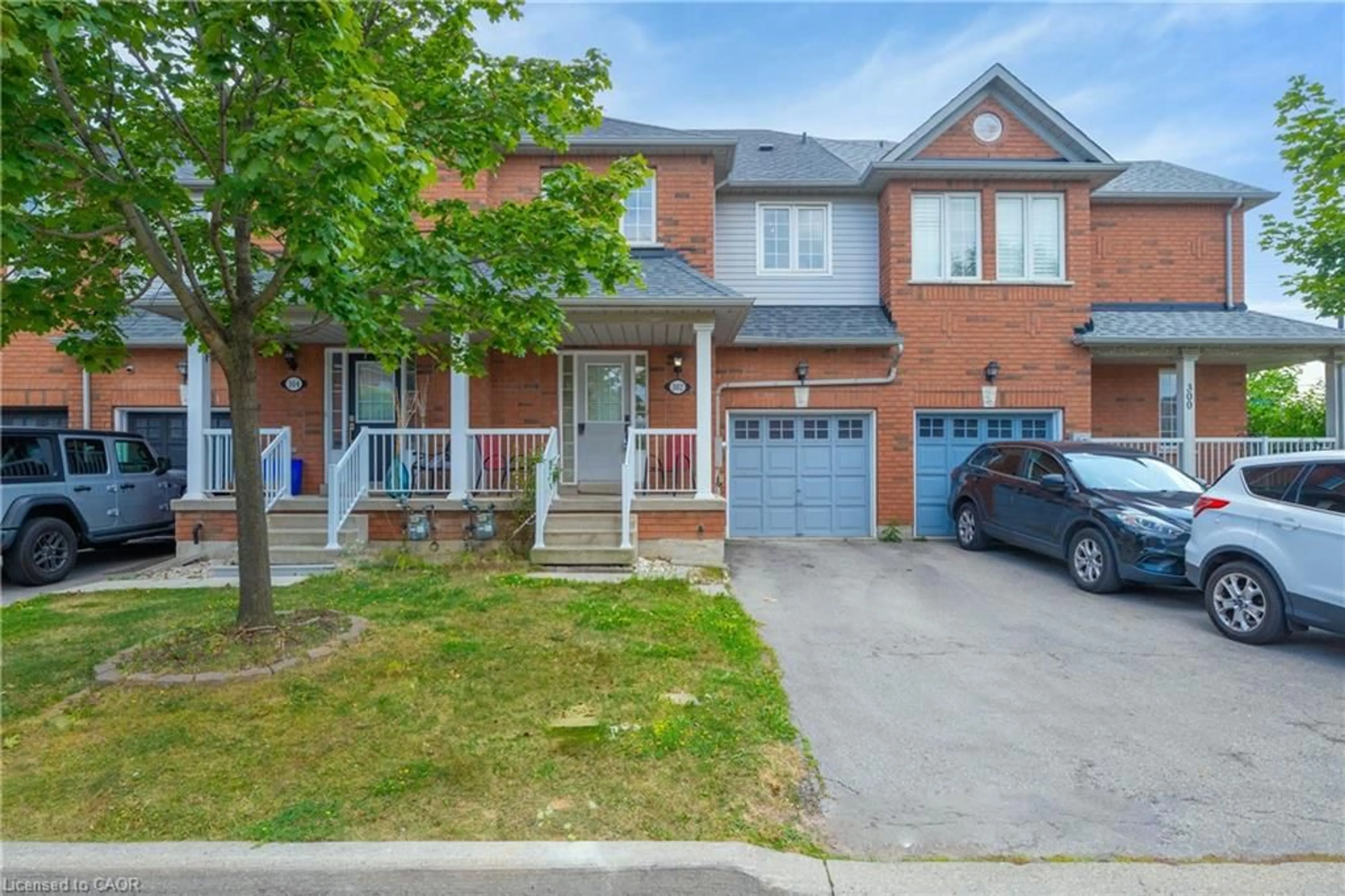 Home with brick exterior material, street for 302 Black Dr, Milton Ontario L9T 6S2