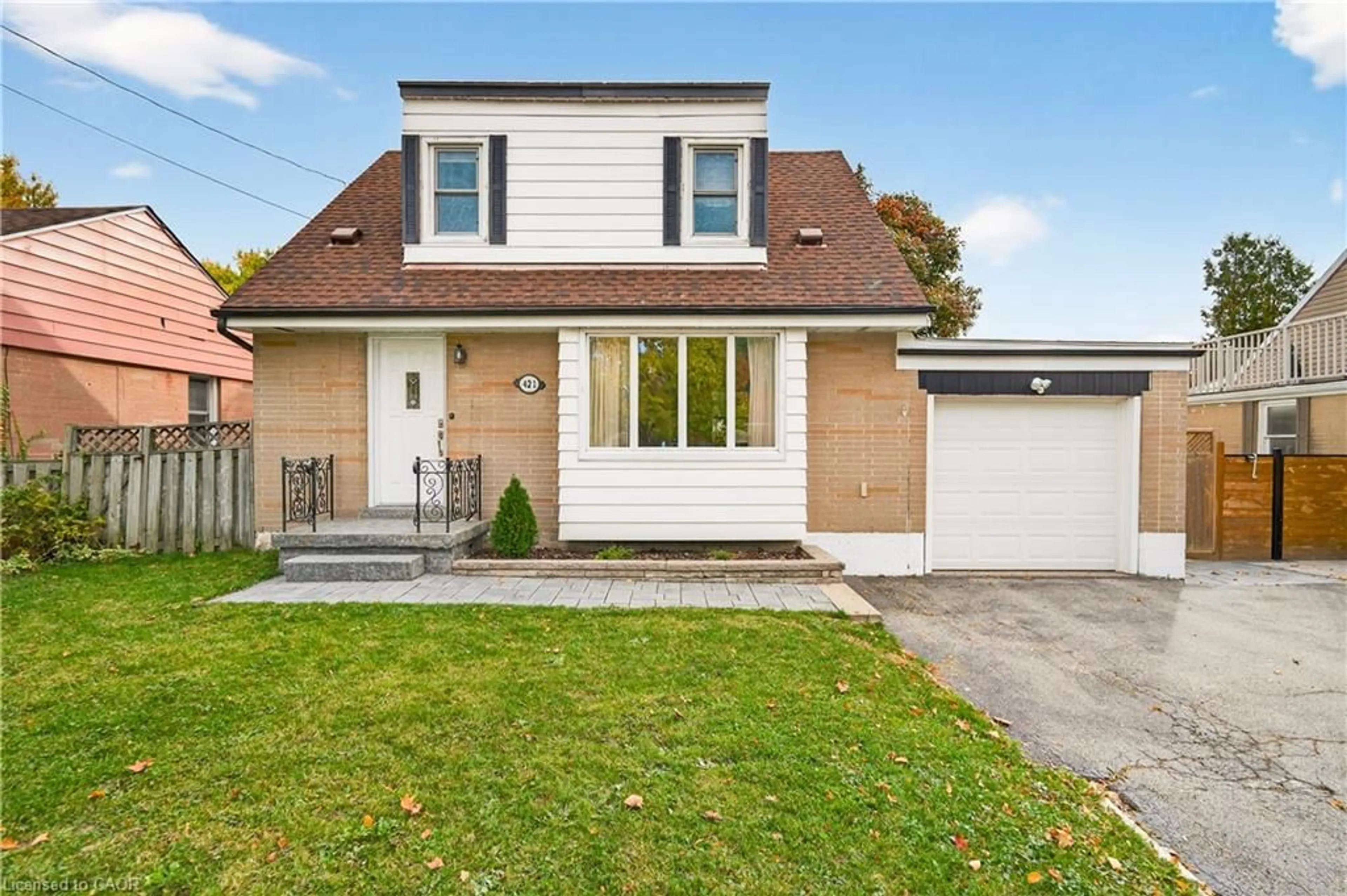 Home with brick exterior material, street for 421 East 36th St, Hamilton Ontario L8V 4A3