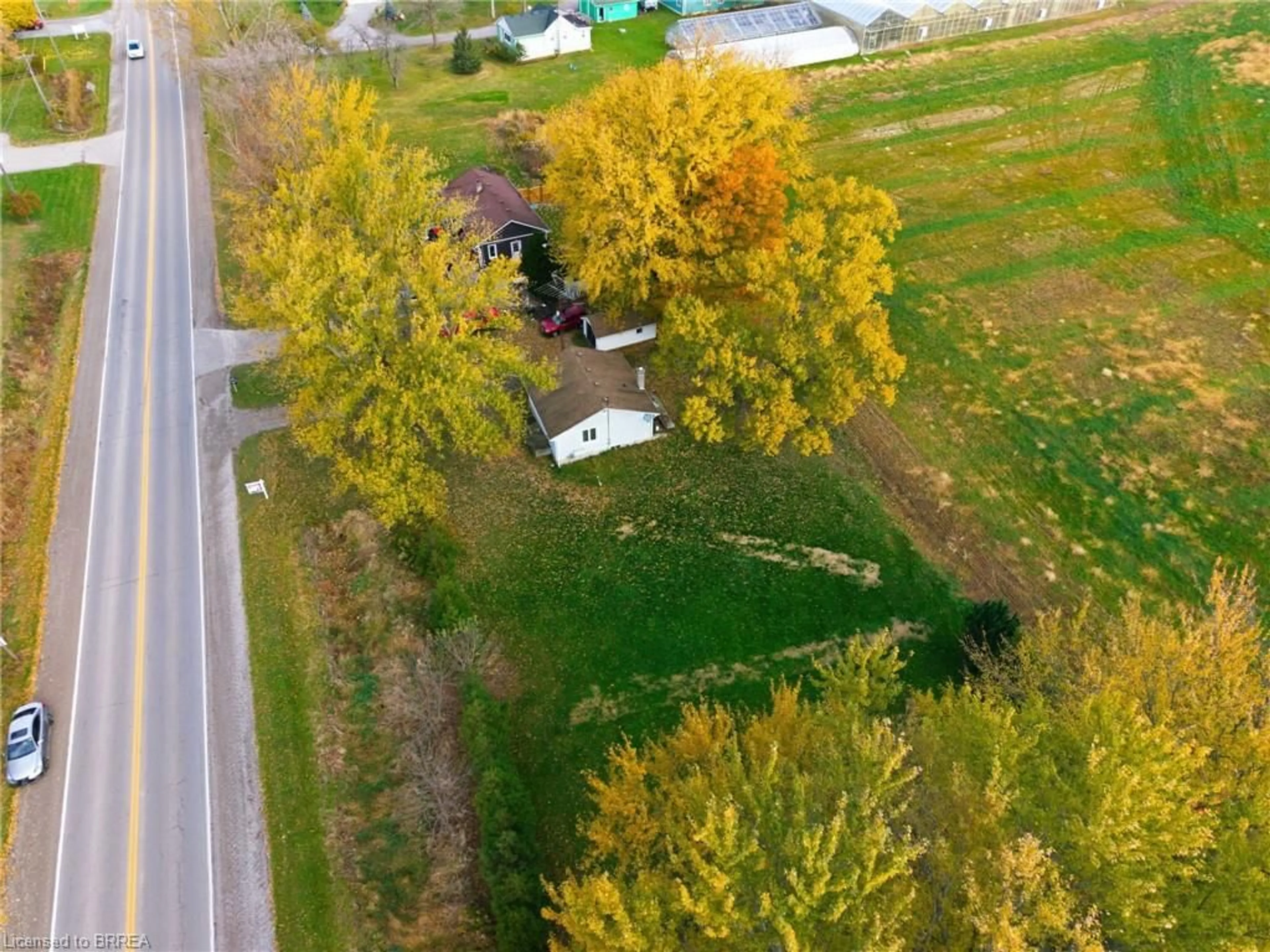 A pic from outside/outdoor area/front of a property/back of a property/a pic from drone, street for 2094 Cockshutt Rd, Waterford Ontario N0E 1Y0