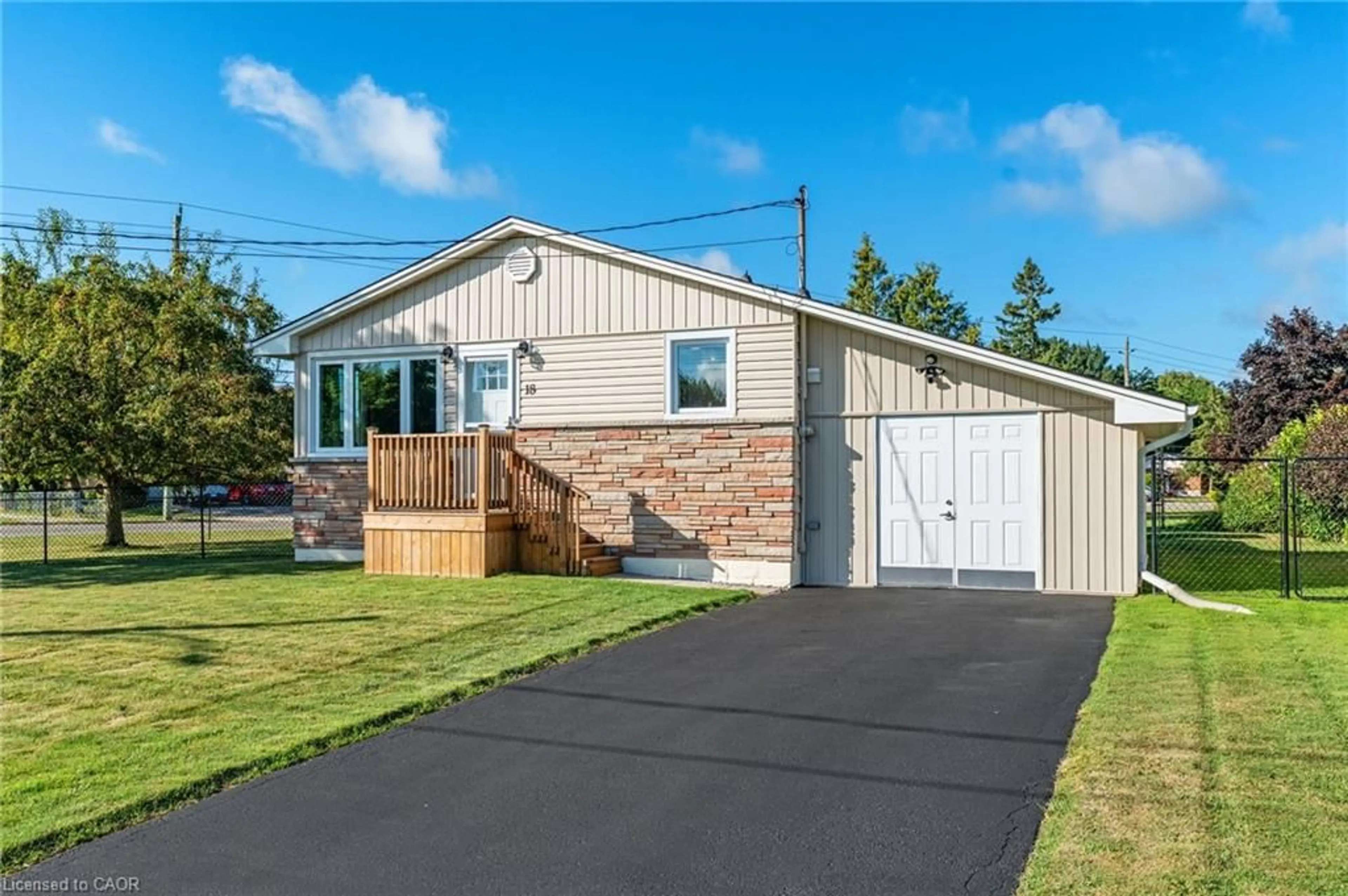 Home with vinyl exterior material, street for 18 Laidlaw St, Hagersville Ontario N0A 1H0